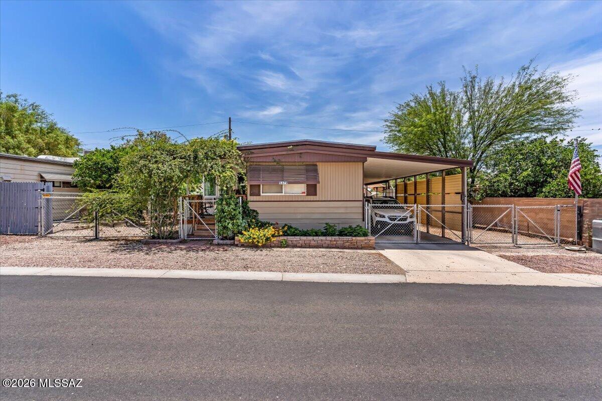 Seller is willing to rent back Home for the Summer of 2026. This is Resort-style living at an affordable price. Fully Furnished. Arizona Room provides the perfect place for pursuing your favorite crafts, office, or simply relaxing while soaking in the stunning mountain views. The outdoor space is exceptionally functional, bosting two separate storage sheds (10x10)(9.5x8.5) that are equipped with electrical power making it an ideal setup for a workshop, hobby space, or abundant extra storage. Gardeners check out the Raised Garden Beds, Green House and water harvest. Trees are Peaches and Limes. HOA incl. Golf, Pickleball, Pools, Spa, Community Center, Activities, Hiking trails and more.