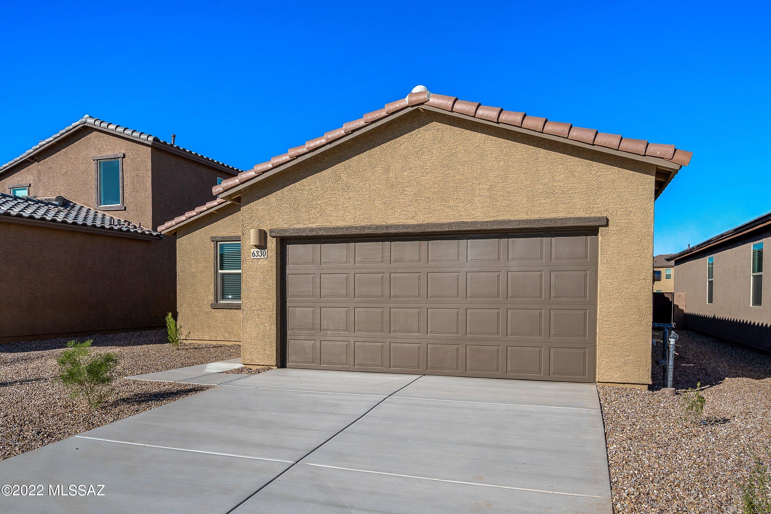 Welcome home to 6330 S Crescent Peak Dr, nestled in the heart of Tucson, AZ! This beautifully designed 3 -bed, 2 -bath home offers the space, comfort, and style your family deserves. Enjoy an open-concept layout filled with natural light, a chef-inspired kitchen perfect for weeknight dinners, and a private backyard ideal for playtime or weekend barbecues.

Located near top-rated schools, parks, and shopping, this home combines peaceful neighborhood living with easy access to major highways. Professionally managed by Reszi, you'll enjoy 24/7 maintenance support, flexible move-in options, and our signature Zero Deposit program.
