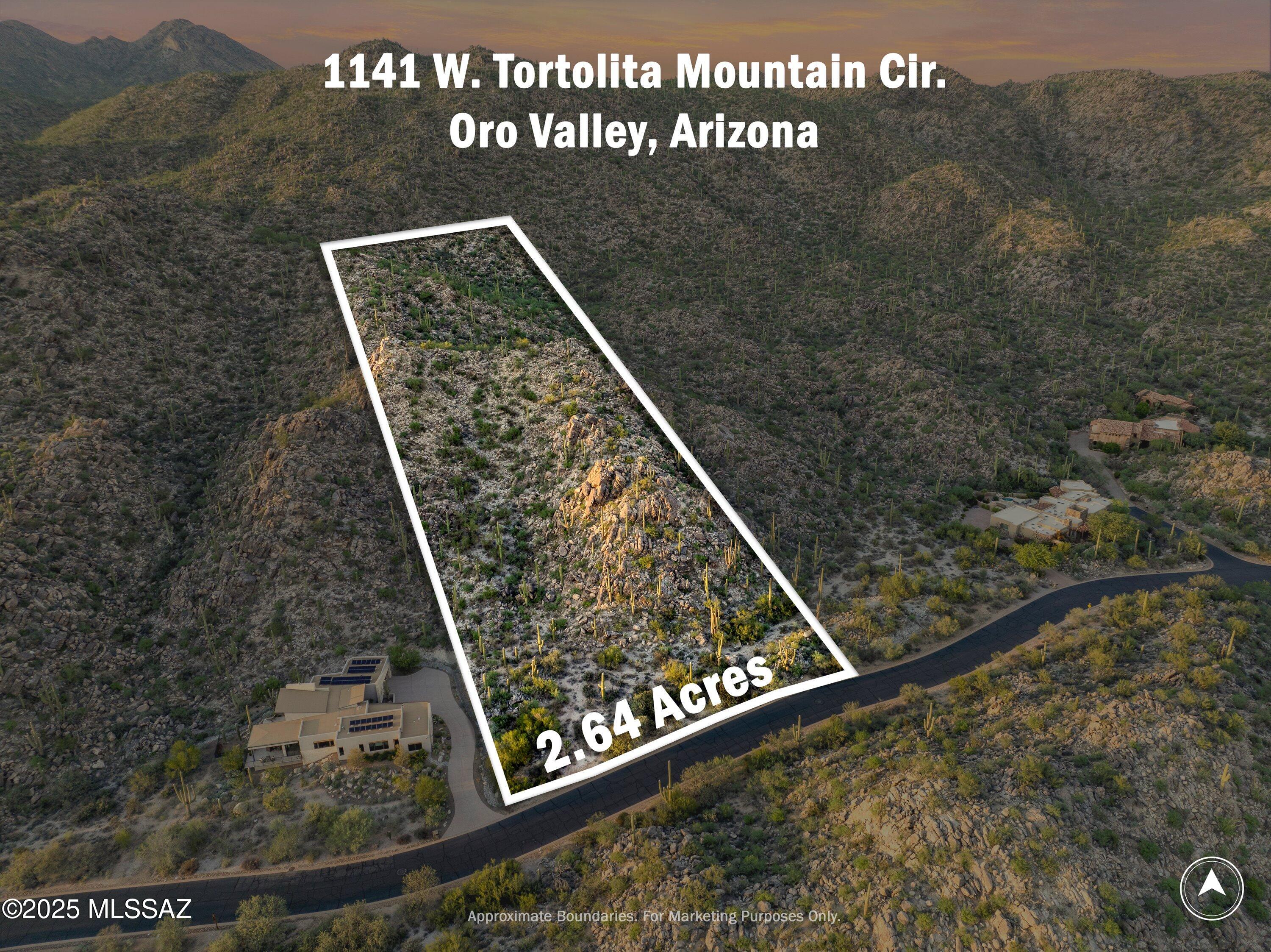 Luxury and nature harmoniously blend offering an unparalleled site for constructing a luxurious residence tailored to your aspirations. This exceptional 2.64 acre Saguaro-studded, ultra private lot, located across the street from the 15th fairway, offers a dramatic rock outcropping backdrop and breathtaking views. While the lot's beauty might not be fully apparent from the street, the building site is truly spectacular. The homesite is set back from the road and sits higher, offering the opportunity to raise the building pad.  From this vantage point, the views of the Catalina Mountains are stunning. Behind the property, towering rock formations may rise up to well  over 100 feet above, with a mature stand of saguaros adding a striking backdrop that ensures privacy. Stone Canyon is one of the top private golf club communities in Tucson, renowned across the country. You can build your dream home whenever you're ready. Club membership is required for either social or golf privileges. Residents have access to world-class amenities, including the prestigious Jay Morrish-designed championship golf course, an elegant clubhouse with restaurant and bar, state-of-the-art fitness and wellness facilities, tennis and pickleball courts, as well as resort-style pools ( family and lap) and a spa.