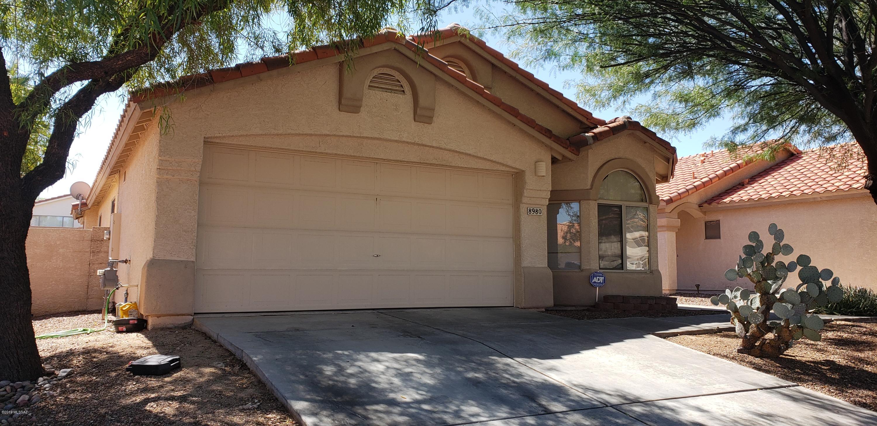 Located in Rita Ranch community on Tucson's East Side, this charming home features a split-bedroom floor plan ideal for privacy and functionality. Enjoy tile flooring throughout with carpet in the bedrooms, and high ceilings that bring in plenty of natural light, creating an open and airy feel. The home offers a spacious great room, open concept kitchen overlooking living room area with an island - perfect for entertaining while enjoying time in the kitchen. A large backyard with a covered patio and south facing allows for beautiful daylight throughout the day. Tenant occupied until 06/30/2026