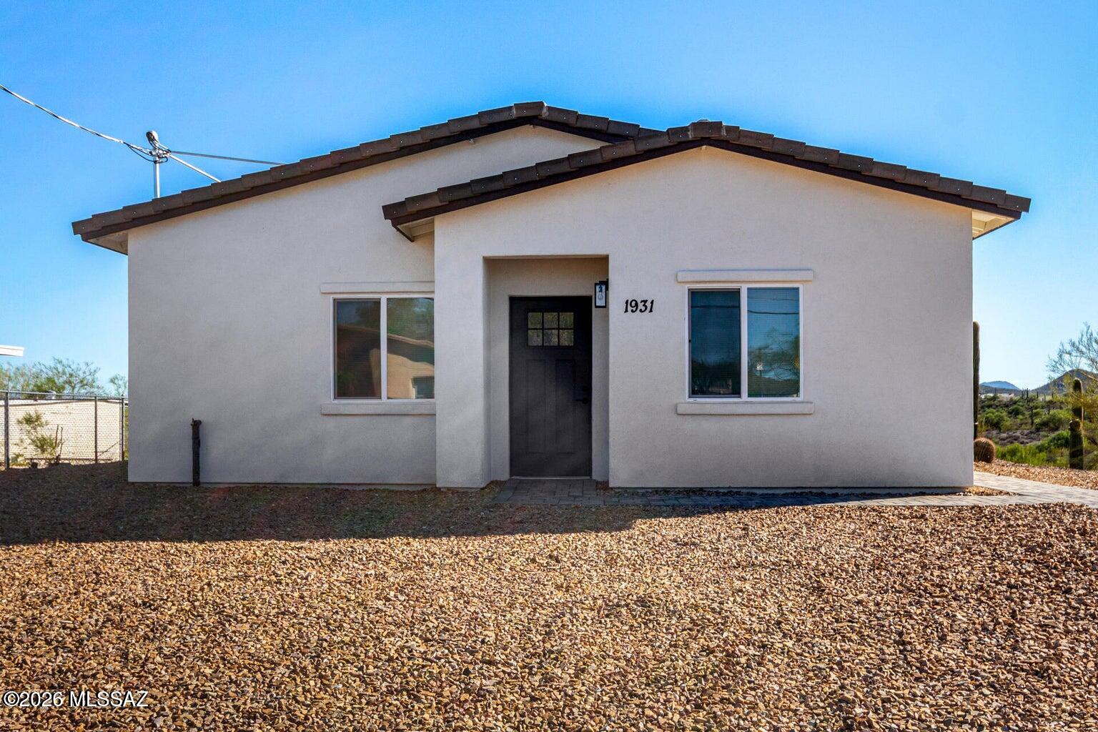 Agent/ Owner, Welcome to this beautiful, newly built 3-bedroom, 2-bath Corona de Tucson residence, offering 1,368 sq ft on a premium lot with breathtaking mountain views. The open-concept layout & soaring 9-foot ceilings combine style & comfort throughout. The kitchen features white cabinetry with crown molding, granite countertops & recessed lighting. Neutral tile flooring flows seamlessly throughout, enhancing the modern aesthetic. The primary suite is a peaceful retreat. Enjoy spectacular sunsets from your private backyard.