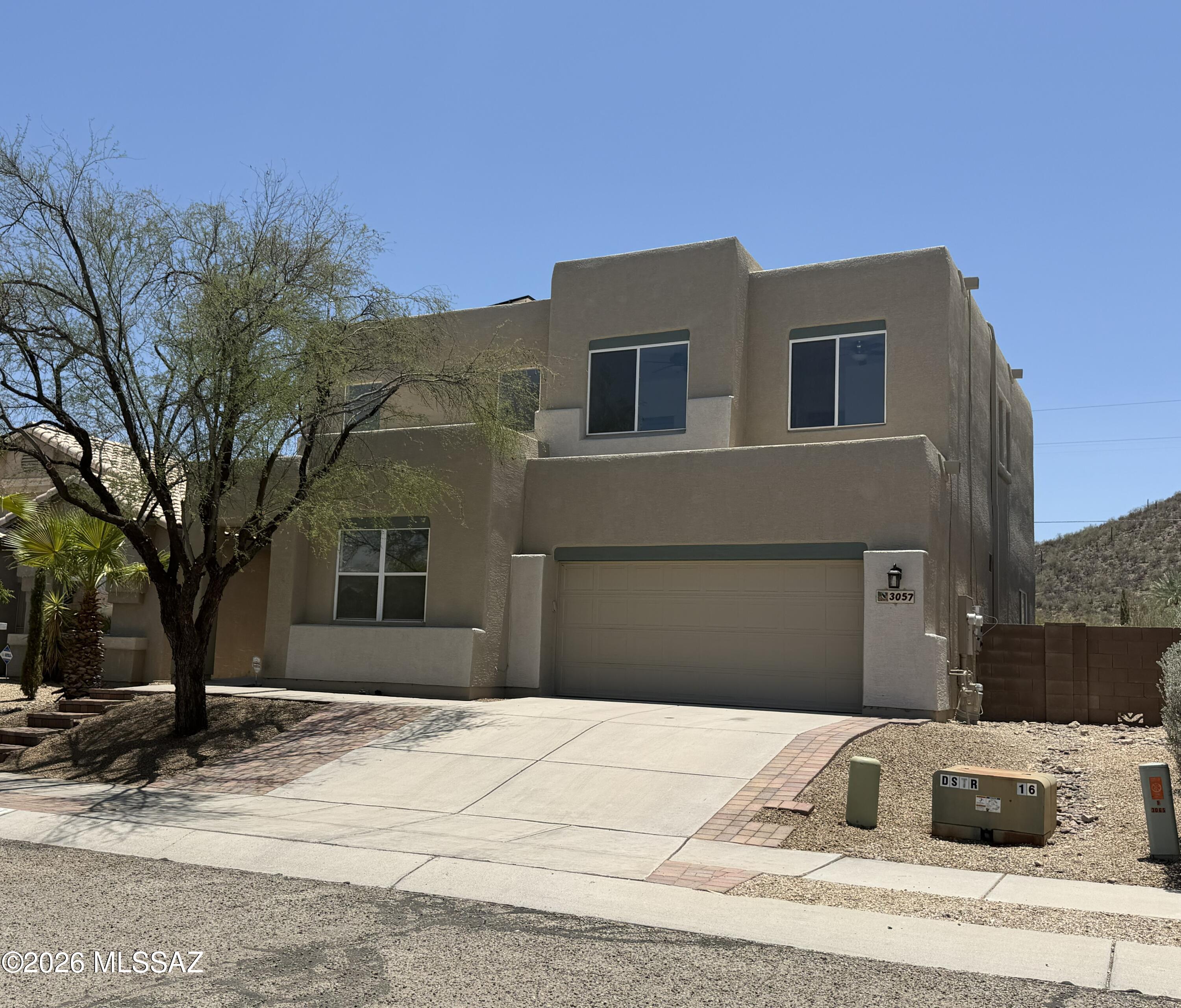 Coming Soon!! Great West Side location!! Desert Star is a small community near Pima College, the downtown hub, Gates Pass, the mountains, natural desert, and amenities galore.  This home is a Spacious 4 BR plus office/Den that has many unique features. The impressive 15 ft ceilings upon entrance appears to go up forever and is in-view of an upstairs interior balcony. It is an attention grabber. The entire interior is freshly painted white, which is a blank canvas for a buyer to create their dream home. The brand new appliances are unused (excluding the dishwasher) and hard to resist. Of course you cant miss the beautiful wood laminate floors, they have been freshly polished and can be a focal point for the new owners interior design ideas. There are no window treatments because it is too hard to cover the views out of most every window. 
Due to the homes 2400 sq ft size one has many options here, including a potential for multi-generational family or an owner that works from home and needs office space. The property placement is near the end of a cul-de-sac with a desert surround.
There is leased solar with a lower than most payment of 81 per mo.

Come and take a look, see if it is your fit.

Note Range Pricing 495,000-510,000 please.

Professional Photos to come!