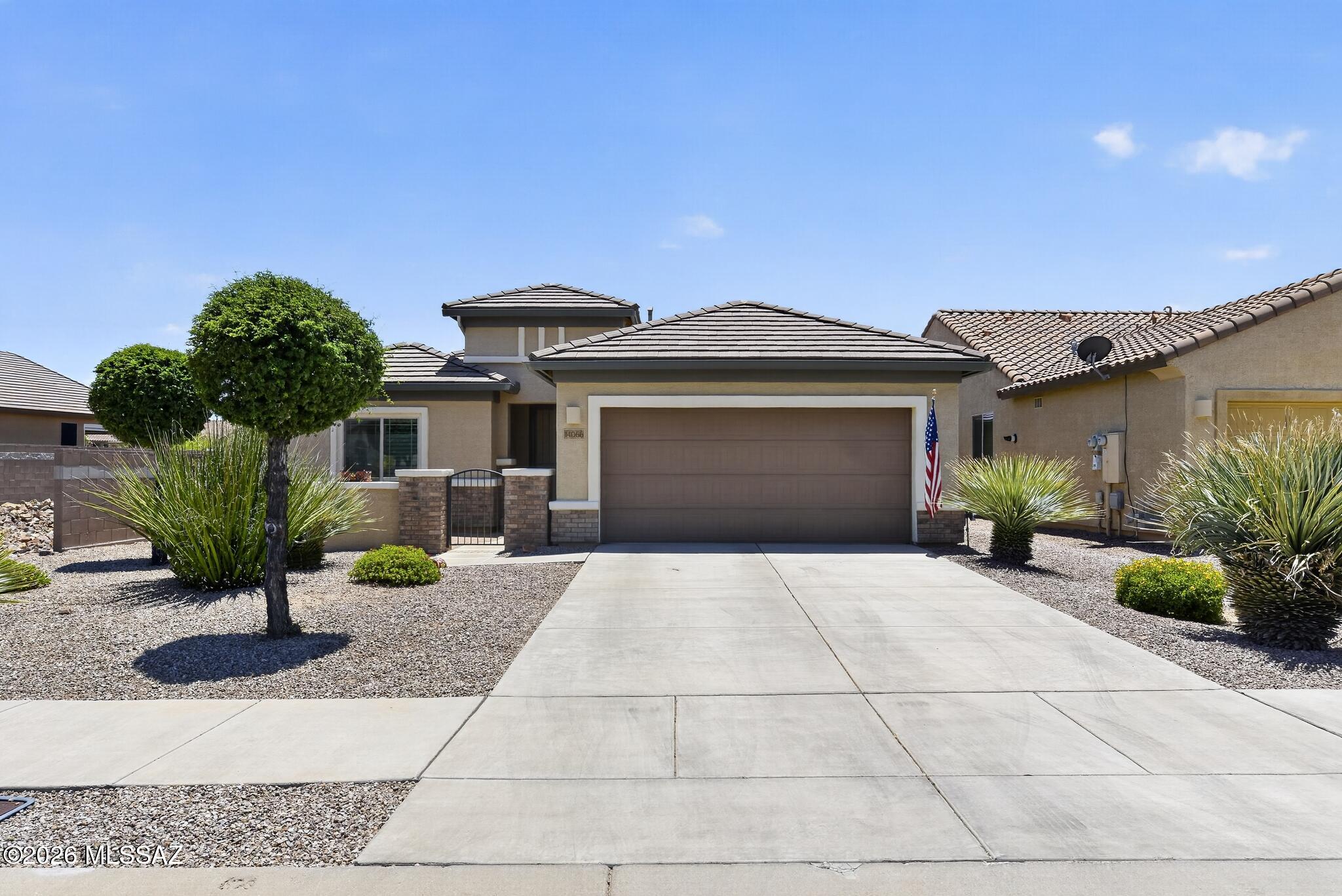 Awesome original owner home in 55+ community of Del Webb at Rancho del lago at a super price. Beautiful tile throughout except berber carpeted bedrooms in this popular Enchantment floor plan. Front courtyard is a quiet hangout & entertaining spot. Grab a good book or your notebook computer and enjoy your beautifully landscaped back yard w/extended covered patio. Spacious kitchen w/lots of counter space, breakfast bar/island, granite counters, & updated cabinetry. HVAC is newer (2020).  Extended garage w/ceiling shelving for storage. Guest bedroom has convenient murphy bed & can be used as a multi purpose room. Plantation shutters give the home a nice look & serve as a great insulation from the hot sun.  Water softener & reverse osmosis filtering system. Great facilities and great people !!