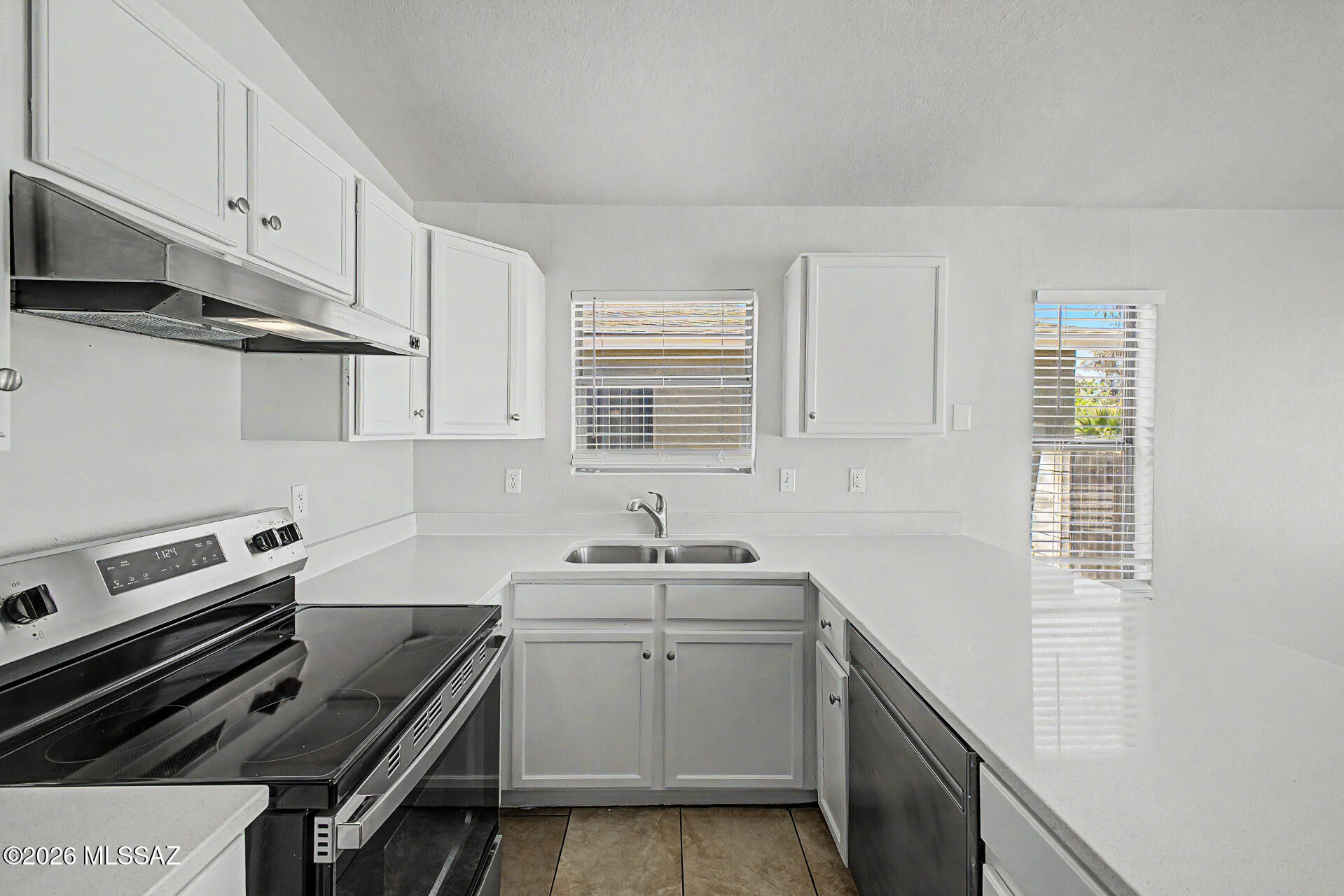 Move-in ready and full of opportunity--this 3-beds, 2-bath home offers comfort, convenience, and NO HOA! Ideally located with quick access to Downtown, the airport, and central amenities, this property is perfect as a family home or an excellent investment opportunity. Inside, enjoy a bright and welcoming layout featuring neutral paint tones, large windows that fill the space with natural light, and smooth ceramic tile flooring . The kitchen offers abundant storage with stylish white shaker cabinets and flows seamlessly into the designated dining area. Outside, the low-maintenance yard gives you more time to enjoy your home and less time on upkeep. Conveniently located and truly move-in ready, this is a property you won't want to miss!