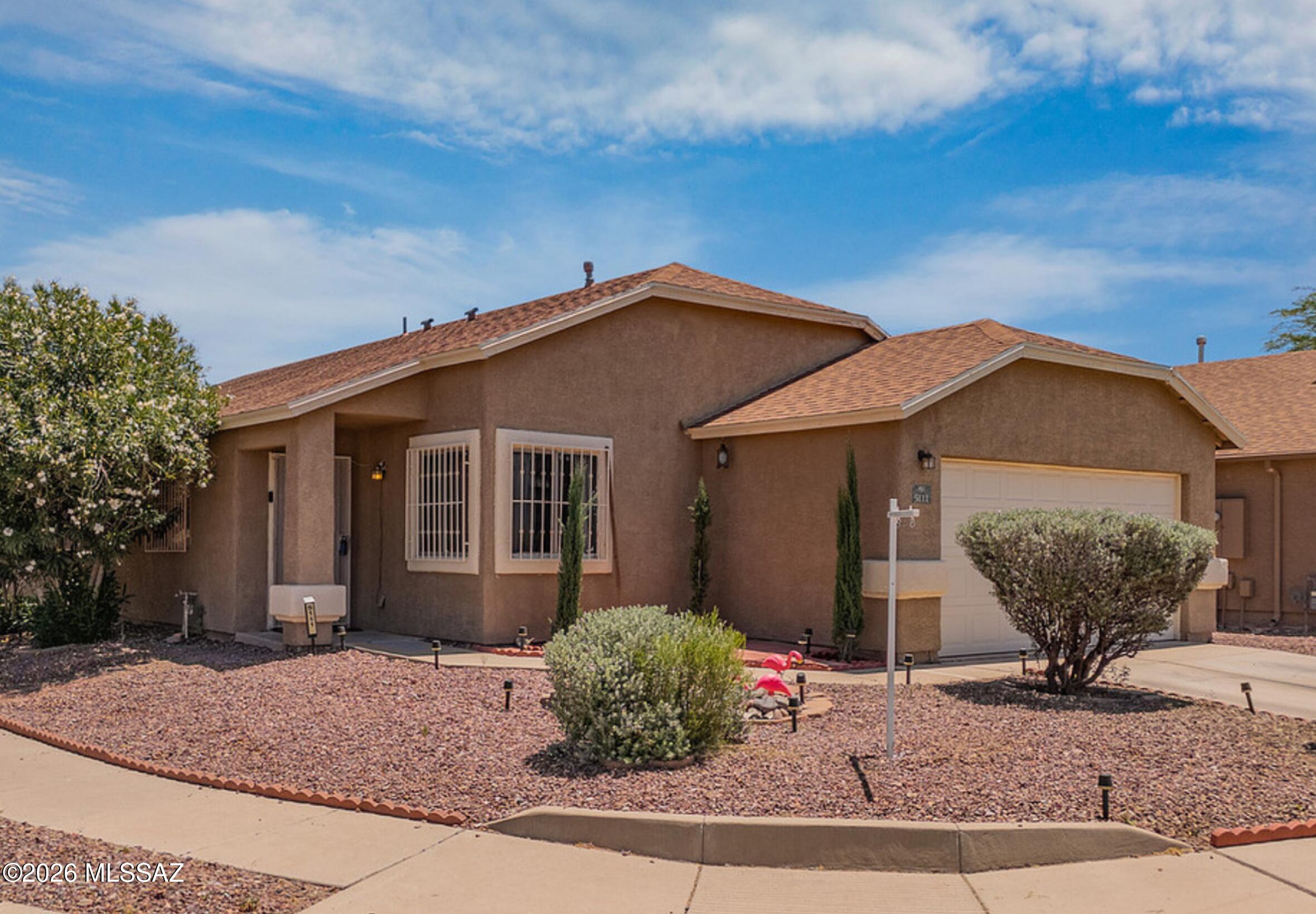 Well-maintained single-story home located on a corner lot. Inviting open floor plan with updated flooring throughout the home. Spacious kitchen with island. Kitchen appliances are included. Updated bathrooms. Landry room with washer/dryer hookups. Security bars/doors. Enclosed landscaped backyard. Shopping, movie theater, restaurants, and freeways all close by.