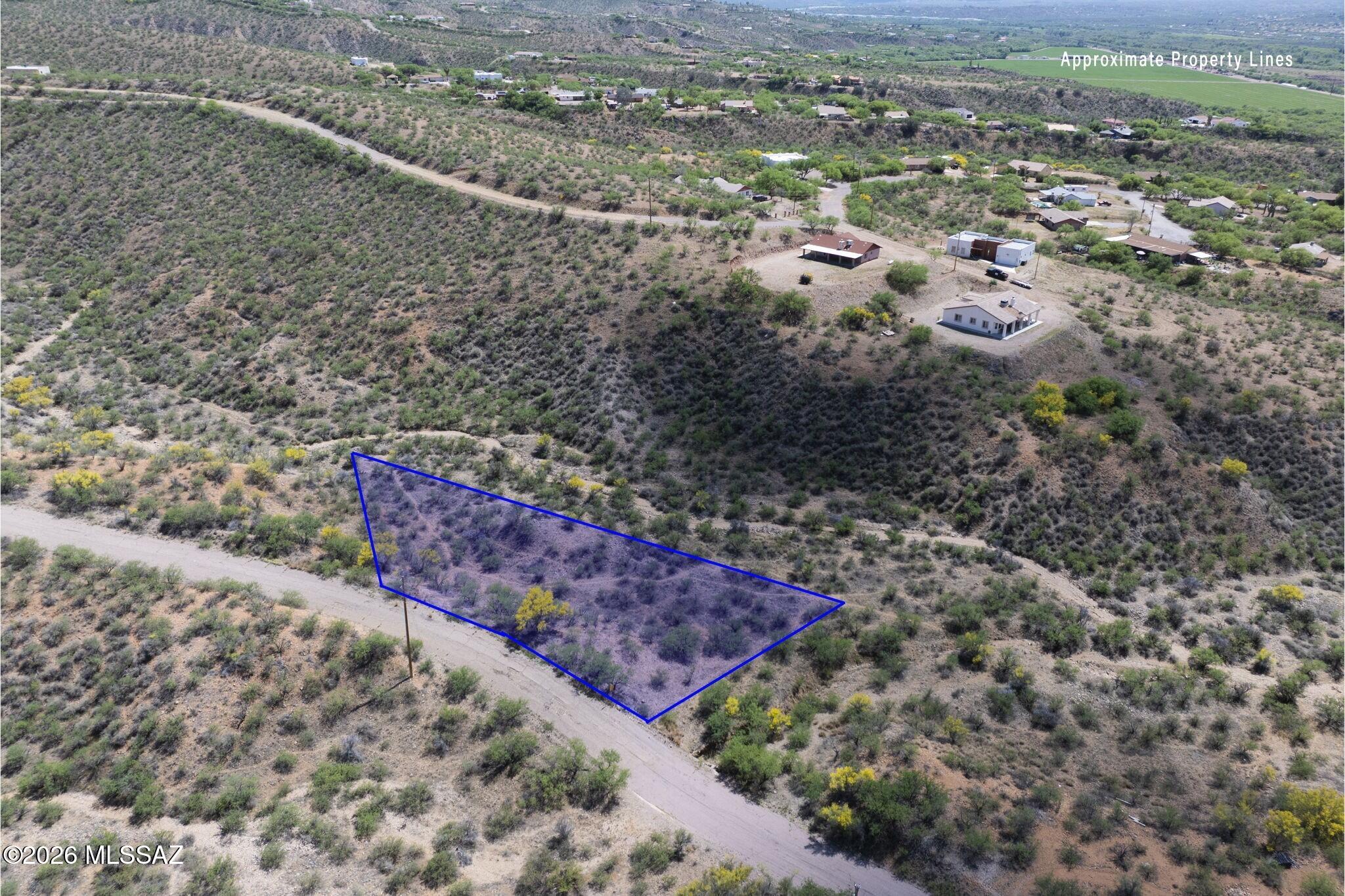 Take advantage of this exceptional opportunity to own a 0.78-acre lot in the sought-after Rio Rico Ranchettes subdivision. Located at 217 Circulo Silva, this spacious parcel offers plenty of room to build your custom home while enjoying the tranquility of Southern Arizona's high desert landscape. Surrounded by natural beauty and scenic mountain views, the property provides a peaceful retreat with convenient access to nearby utilities, shopping, dining, and outdoor recreation. Whether you're looking to build now or invest for the future, this lot offers outstanding potential in a growing community.