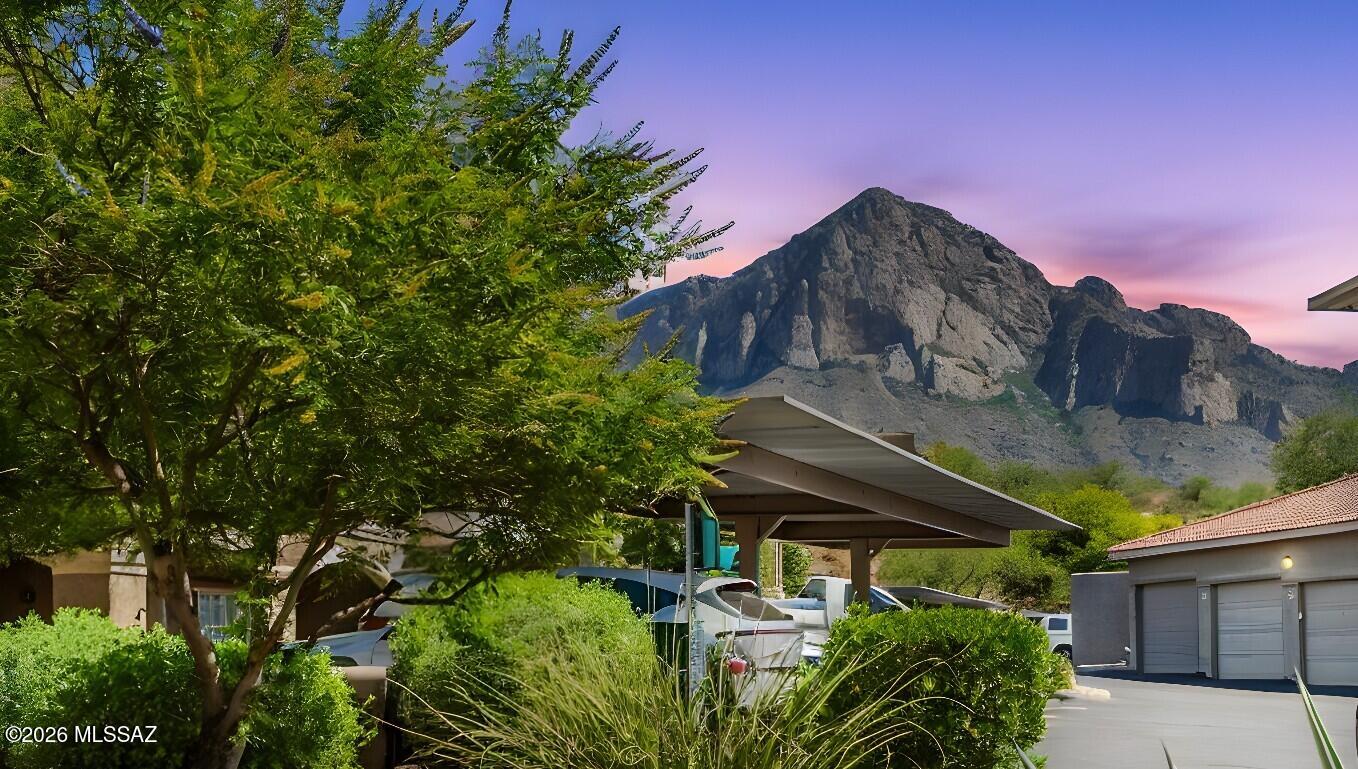 MOUTAIN VIEWS! Step into this beautifully updated first-floor condo 3 bed/2 bath, where luxury, tranquility, & mountain views come together in perfect harmony. The wraparound balcony invites you to sip your morning coffee while soaking in the golden hues of sunrise over the Catalina Mountains.

Inside, every detail has been thoughtfully curated: gleaming quartz countertops, marble backsplash & stainless-steel appliances make cooking feel like a treat. With no carpet underfoot, newer HVAC, windows, and cabinetry, this home is as practical as it is polished. Resort-Style Living Awaits! Enjoy access to amenities including a sparkling pool, rejuvenating hot tub, state of-the-art fitness center, and a welcoming clubhouse with a full kitchen & Picnic areas with BBQs grills.