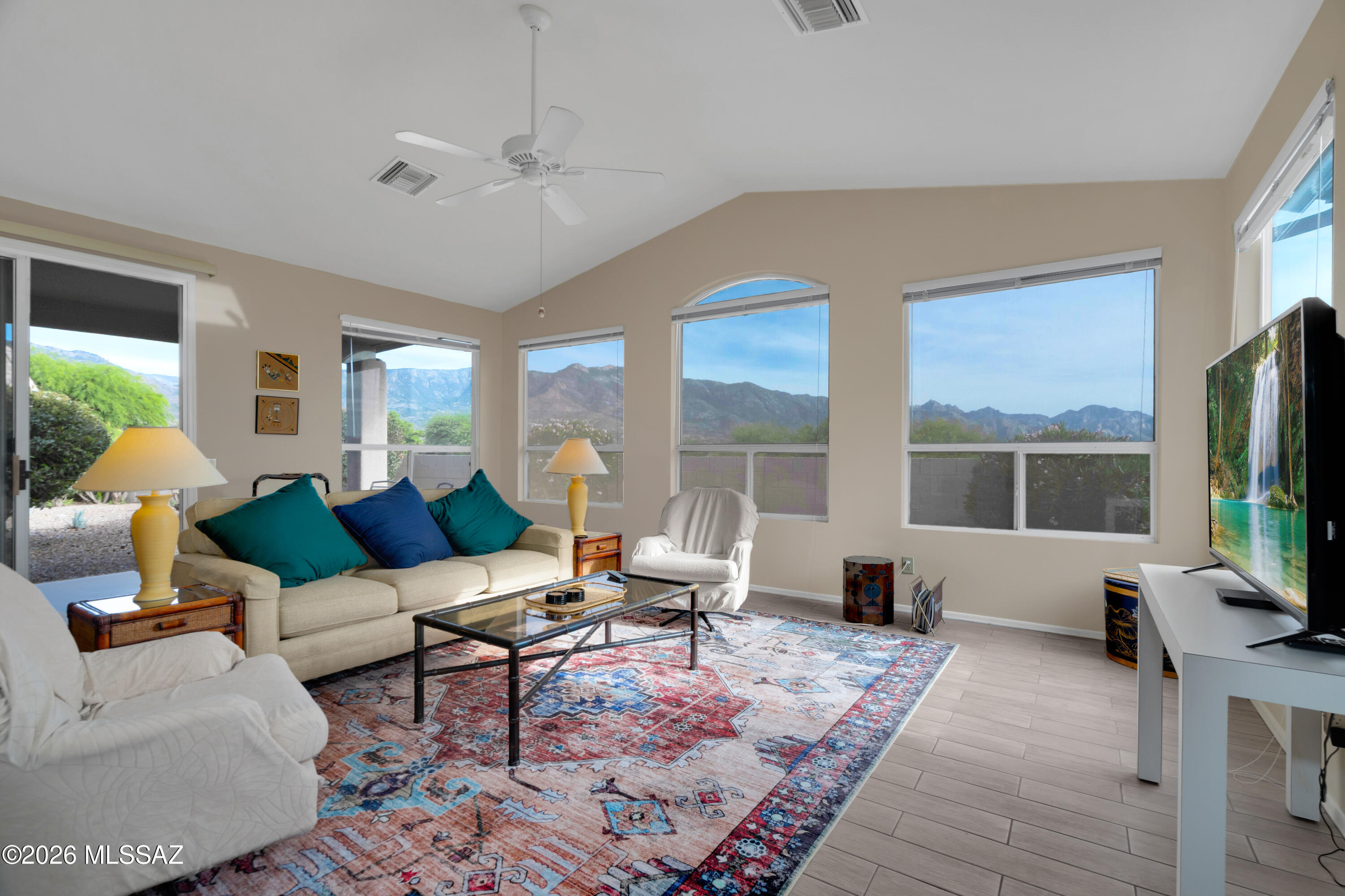 Stunning views await in rare Villa HOA 1- new tile flooring- NO CARPET. Freshly painted and can come fully furnished. Split floor plan with spacious 2 car garage this unit is on the north side of the street with amazing views and just a short walk to the club house. Spacious patio some of the most amazing views