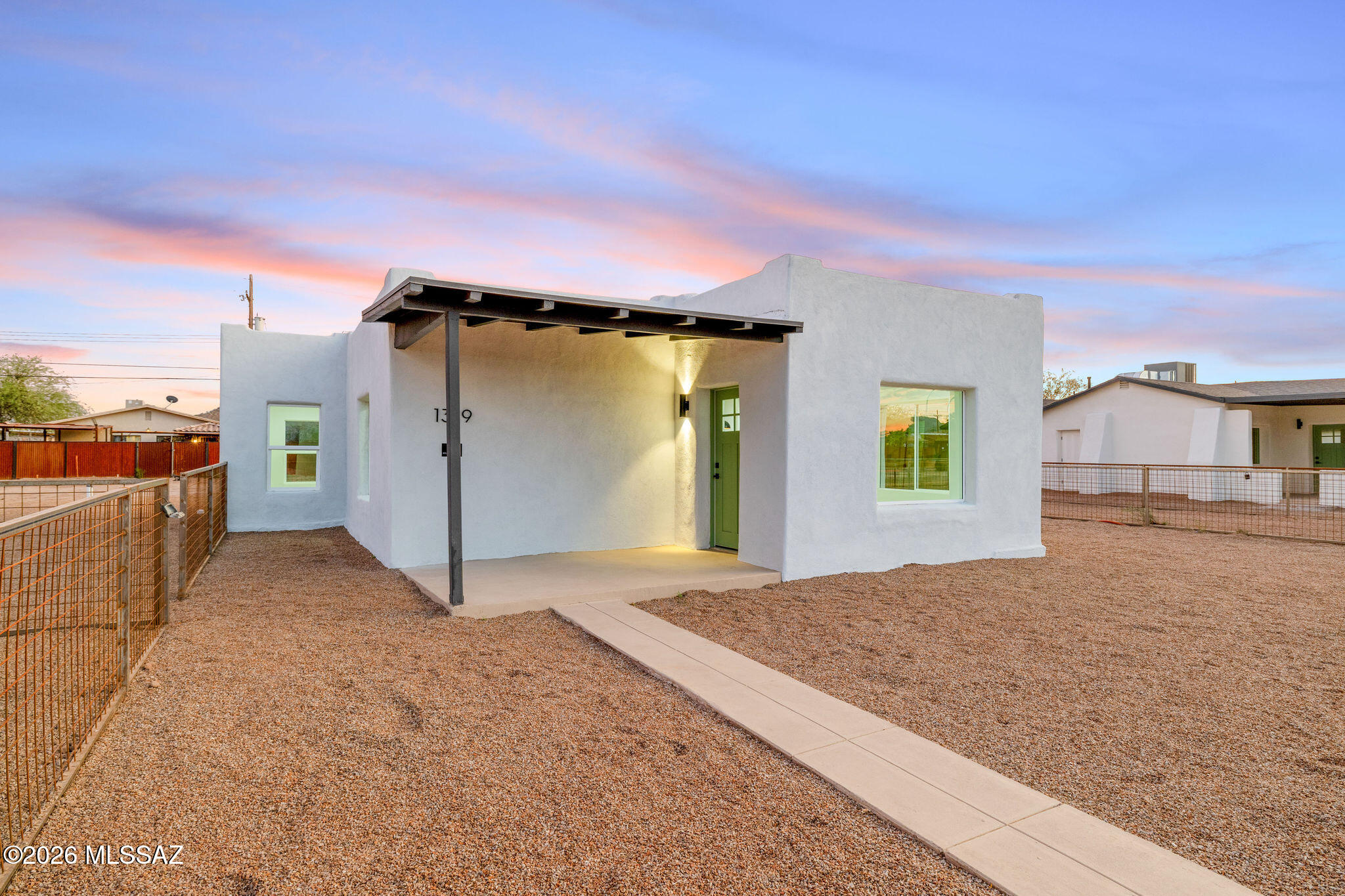 Seller will accept or counter offers between  279,900 & 299,900. Welcome to the brand-new Barrio Hollywood Casitas subdivision, where historic charm meets modern luxury. This beautifully renovated home offers a bright, open layout with clean lines and upscale designer finishes throughout. The brand-new kitchen features custom cabinetry, quartz countertops, stainless steel appliances, and a gas oven/range. Additional upgrades include new air conditioning, new roof, modern black hardware, sleek vanities, recessed lighting, 3-panel doors, dual-pane windows, plank flooring, a new roof, and an efficient new water heater. Enjoy fenced front and back yards per