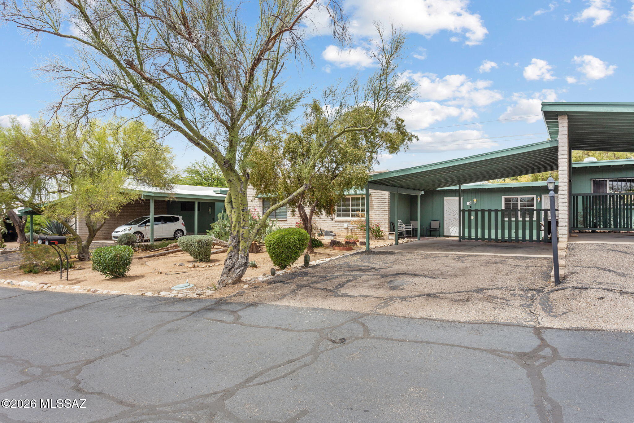 Welcome to your charming, Oro Valley retreat with breathtaking Pusch Ridge views! This move-in ready townhome features a bright, open floor plan with skylights and a fully equipped kitchen. Enjoy stunning mountain vistas from your private covered patio. With a community pool, 2 carport spaces, and an HOA covering front yard care, garbage & more, this home offers easy, low-maintenance living. Located near top schools, shopping, and dining, this desert gem is the perfect blend of comfort and convenience. Don't miss it!