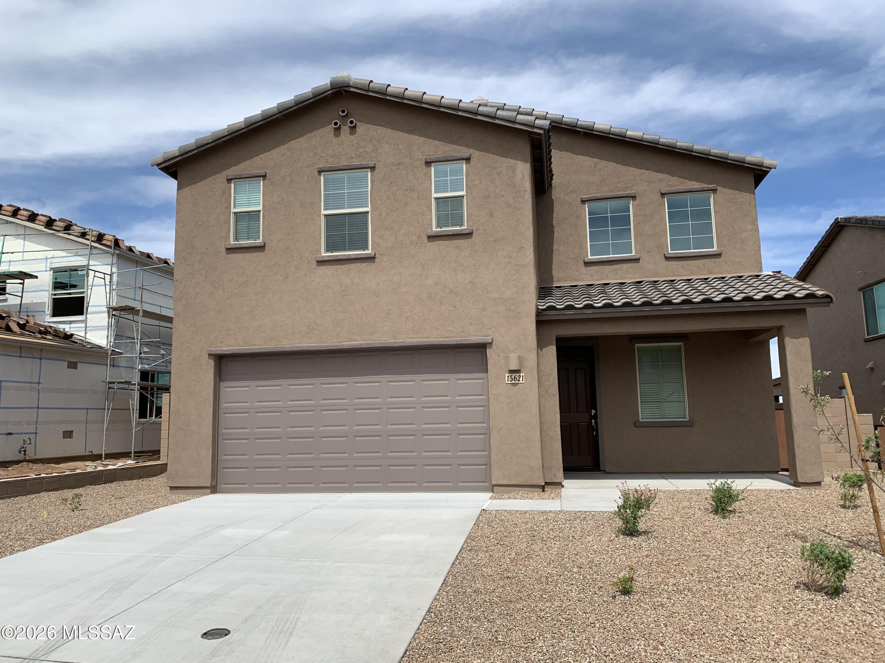Located in the award-winning Rancho Sahuarita community, this newer home offers an exceptional blend of comfort, location, and style.. Ideally situated near one of the community's satellite pools, your home enjoys close proximity to the volleyball and basketball courts, playground, Safari Trail, butterfly garden, splash pad, fitness center, grocery stores, and many additional amenities that make Rancho Sahuarita such a special place to live. With year-round activities and events for all ages, this community truly supports an active, wonderful lifestyle. Wonderful 2 story home with granite ccuntertops, beautiful master bedroom with dual vanity and standing shower. will not last long.