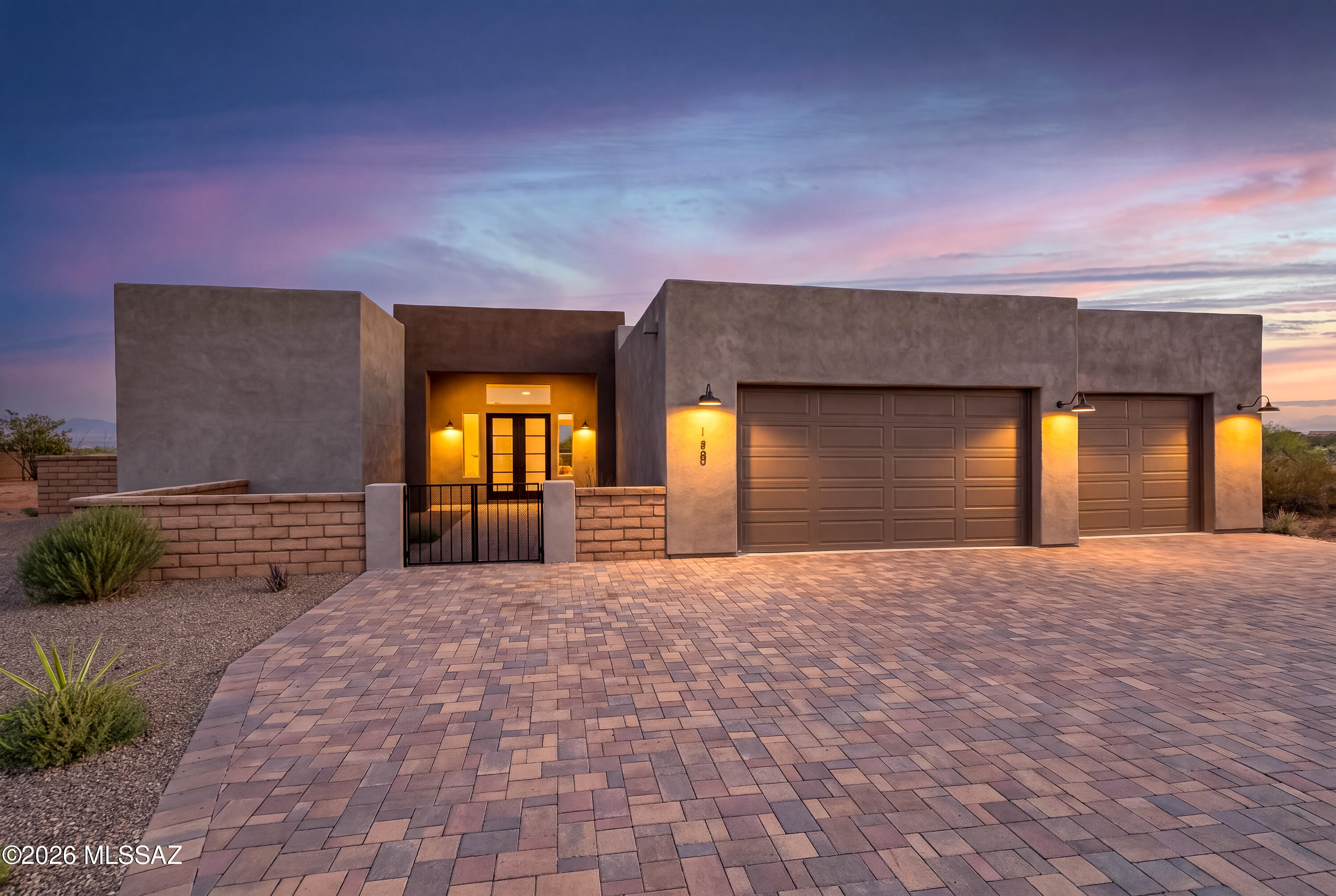 Welcome to your sanctuary in the prestigious gated community of Stone House, where luxury meets modern living in this exceptional 4-bedroom, 3-bath home. Set on nearly an acre of beautifully landscaped grounds, this residence offers an inviting and tranquil retreat that is both stylish and functional. As you enter, you are greeted by an expansive open floor plan with elegant tile flooring, complemented by high ceilings that enhance the spaciousness and natural light throughout.

The heart of the home is the exquisite kitchen, featuring sleek granite countertops and stainless steel appliances, perfect for culinary adventures and entertaining guests. Each of the three bathrooms is thoughtfully designed with modern elegance in mind, showcasing contemporary showers that create a spa-like - -experience. The primary suite is a true sanctuary, complete with a spacious walk-in closet and an ensuite bath designed for relaxation and comfort.

Three additional bedrooms provide flexibility for family, guests, a home office, or creative space, making this home as versatile as it is beautiful.

The outdoor space offers endless possibilities for leisure, entertaining, gardening, or simply enjoying the peaceful surroundings. This property is a seamless blend of sophistication and comfort, making it the perfect place to call home in the highly desirable Stonehouse community. Don't miss the opportunity to experience this exceptional lifestyle!