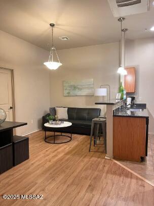 ''Stunning condo in a prime location, steps from the Rillito Walking and Bike Path! Enjoy resort-style living with a sparkling pool, plus the convenience of being within walking distance to shops, restaurants, and grocery stores. This spacious 2-bedroom, 2-bath home is less than 10 minutes from the University of Arizona and Banner Hospital--perfect for students, professionals, or anyone seeking comfort and accessibility!''  Rent price doesn't include utilities. TENANT PAYS FOR UTILITIES Ready for rent. Let us know if you want it unfurnished.