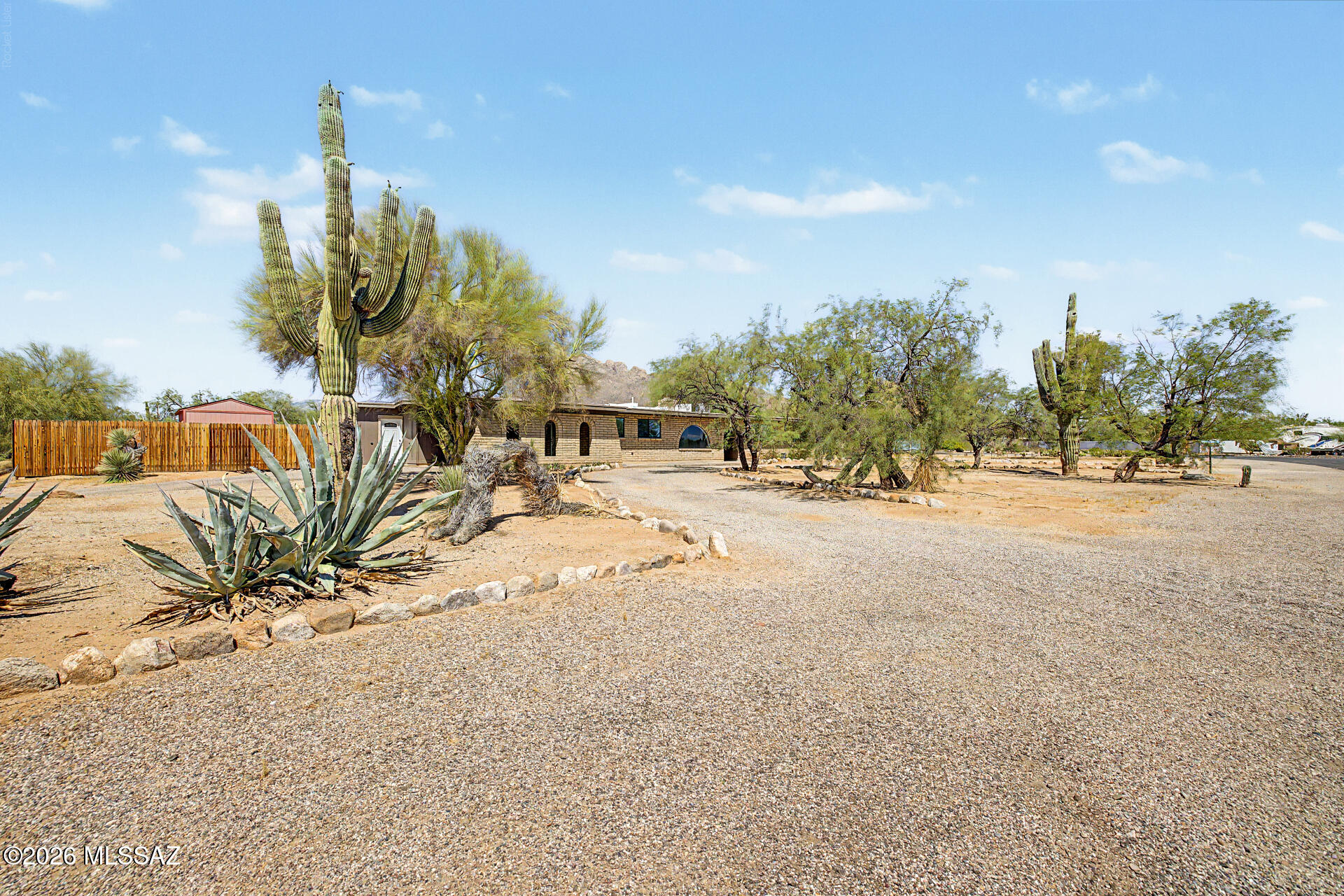 Beautiful Ranch style Corner lot home on almost an acre of land in desirable Casas
Adobes area with amazing mountain views. 3 bedrooms and 2 full baths in the main
house with a 383 square foot guest house studio including a kitchenette and additional
full bathroom. Was a successfully AirBnB rental. Central AC was replaced in 2024.
Everything else was new as of 2021: Roof, flooring, fixtures, cabinets, water heaters,
pool plaster and pump, windows and doors. Owned Solar and new upgraded electrical
panel was installed in 2022. It's basically a brand-new house with room to grow. Plenty
of parking with a large horseshoe driveway. Schools close and bus stops right in front of
the house.