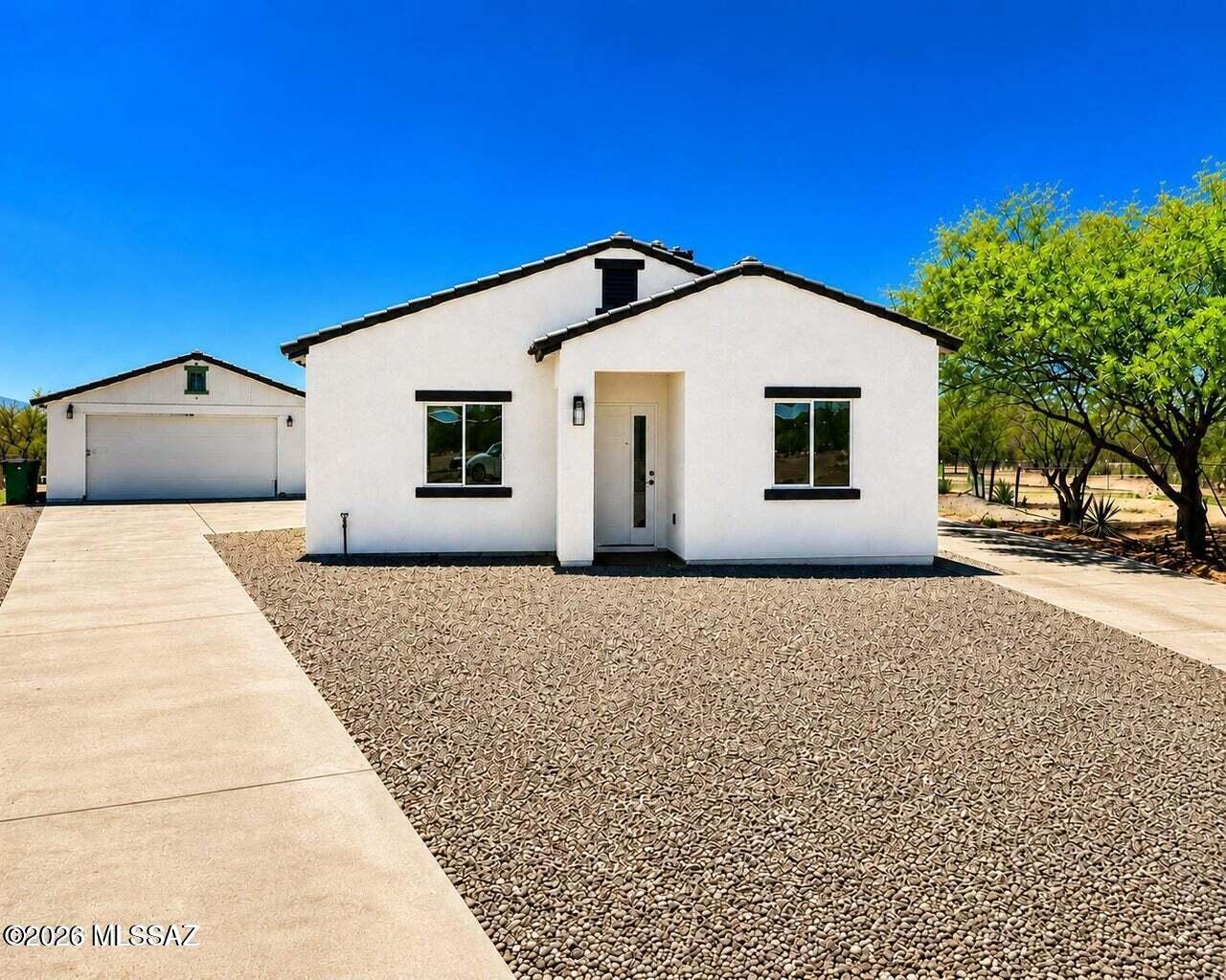 New Construction! This beautiful 3-bedroom, 2-bath home is located in the Southwest area of Tucson and features modern finishes designed for comfort and functionality. The property includes a detached 2-car garage, providing ample space for parking and storage. A great opportunity to own a brand-new home in a growing area of Tucson. Owner/Agent.