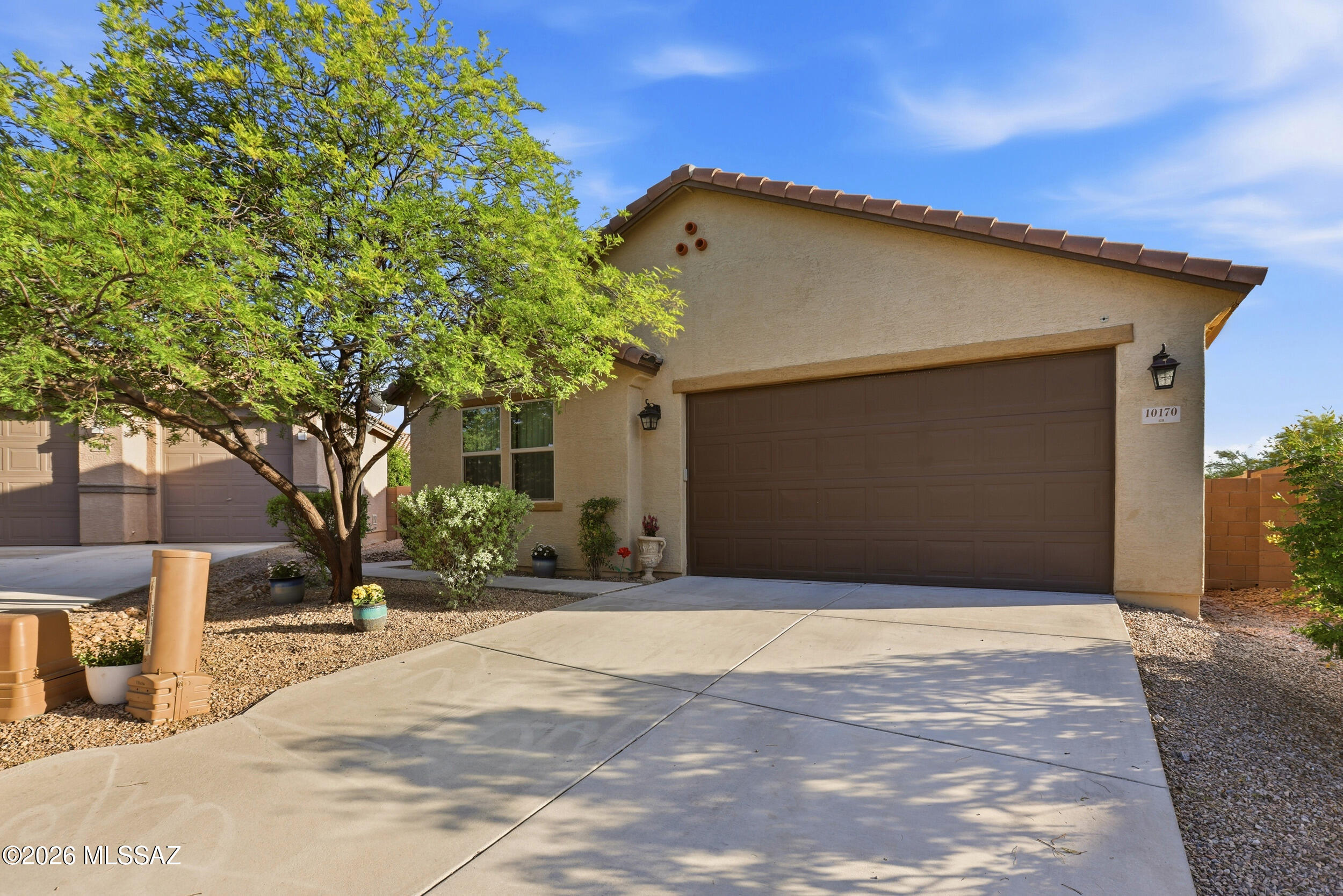 Welcome Home to Elegance and Functionality with this well-appointed 3 bedroom, 2 bath home with a den on a cul-de-sac lot in East Tucson. The upgrades are classy and timeless, featuring high ceilings, tall doors, a gourmet kitchen with granite tops, stone backsplash and SS appliances, and a fully-finished backyard. Built in 2016, this contemporary 2013 SF home is fabulous for entertaining guests in the spacious great room with a kitchen island that can accommodate large gatherings. The den is separated from the great room by a long hallway, making it a truly versatile secondary living area. Come. See. Stay!
