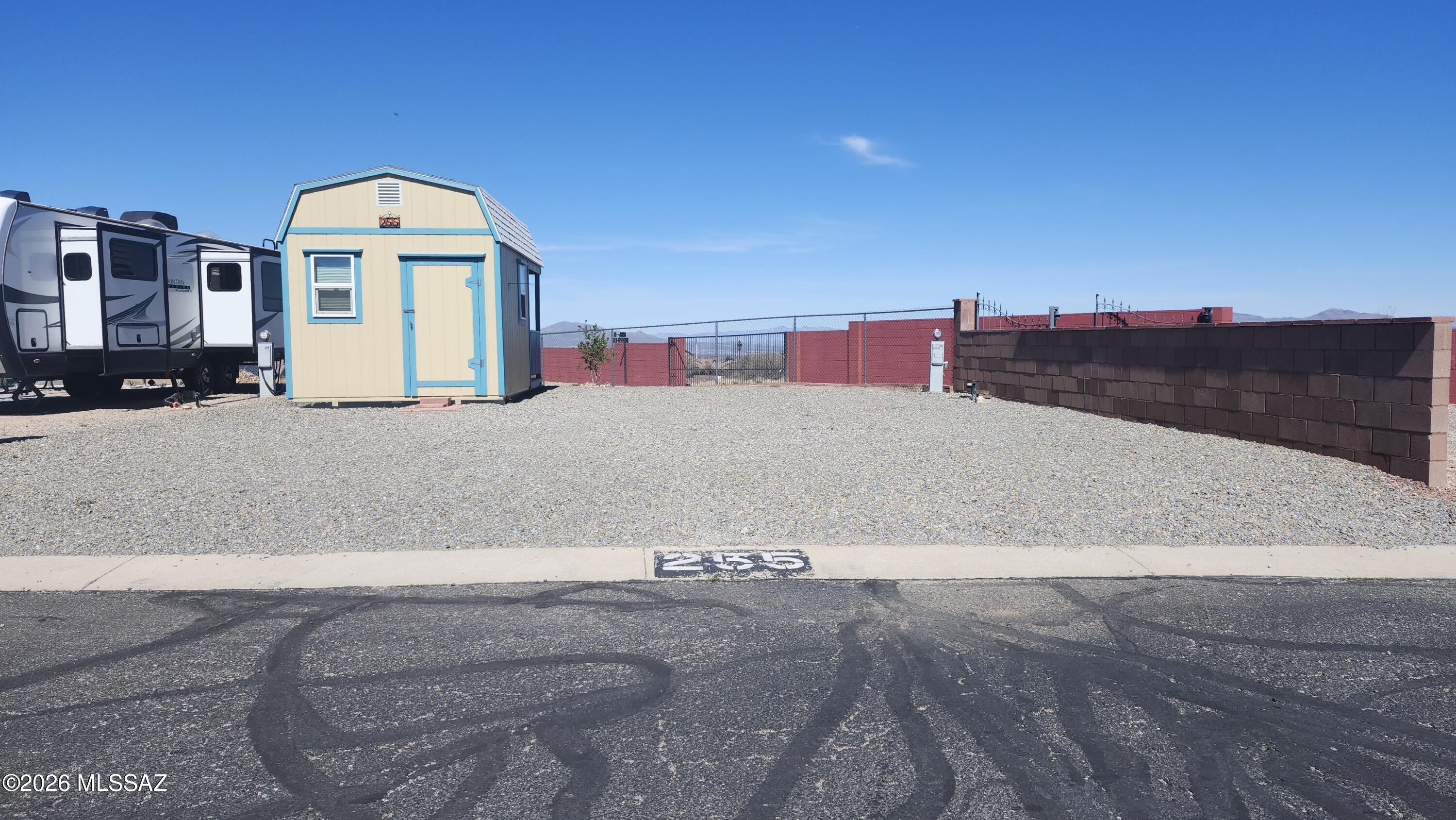 2000+ sq ft RV lot in the Cochise Terrace subdivision.
Mountain Views to the NE not to mention the 10' x 16' storage shed with a 4' porch on the N side facing the mountains. 
Come see why so many Snowbirds call this their winter home.