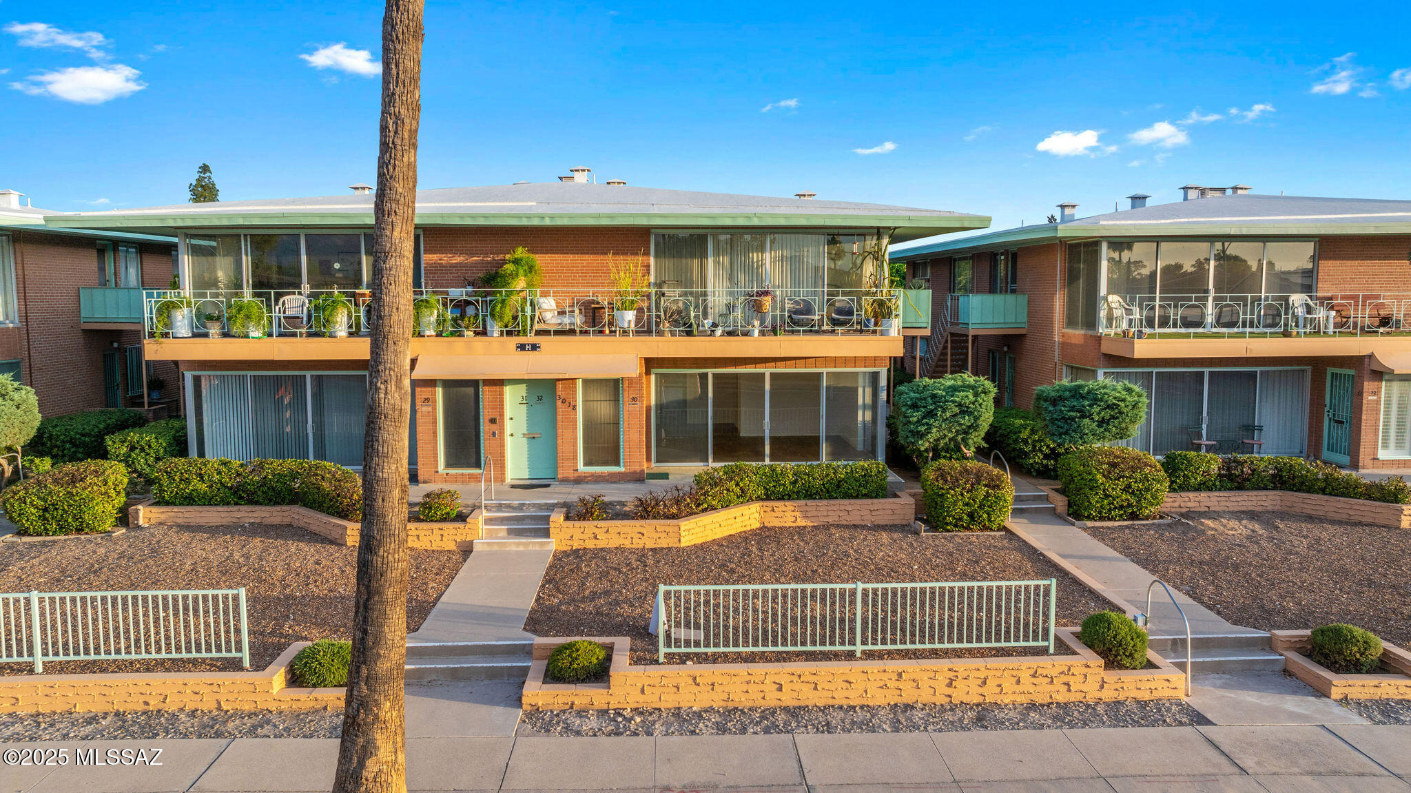Seller shall accept or counter offers between $299,000 - $309,000. Beautiful Devall Design creation, two bedroom, two bath lower unit in Villa Catalina, listed on The National Historic Registry in the Sam Hughes neighborhood. New engineered hardwood flooring. Bathrooms feature mid-century appropriate Terrazzo look luxury vinyl tile. New kitchen with complete suite of Samsung Smart appliances including a 30'' Bespoke induction range with Air Fry and convection features, counter depth fingerprint resistant French Door refrigerator and Storm Wash dishwasher. Premium Quartz countertops and backsplash tile feature wall. Freestanding vanities in both bathrooms, featuring luxury Delta Trinsic fixture, upgraded Bedrosian tile surround with Delta upgraded multi-function shower systems. Designer curated lighting throughout. Plenty of storage and a deeded single car enclosed garage. HOA includes all utilities, property taxes, structure insurance, all common areas, two pools, one heated, beautifully landscaped and maintained grounds and much more. This 55+ community is central to everything, highly desirable (only 79 units) and is an example of Modern design and postwar garden apartment, indoor-outdoor living.