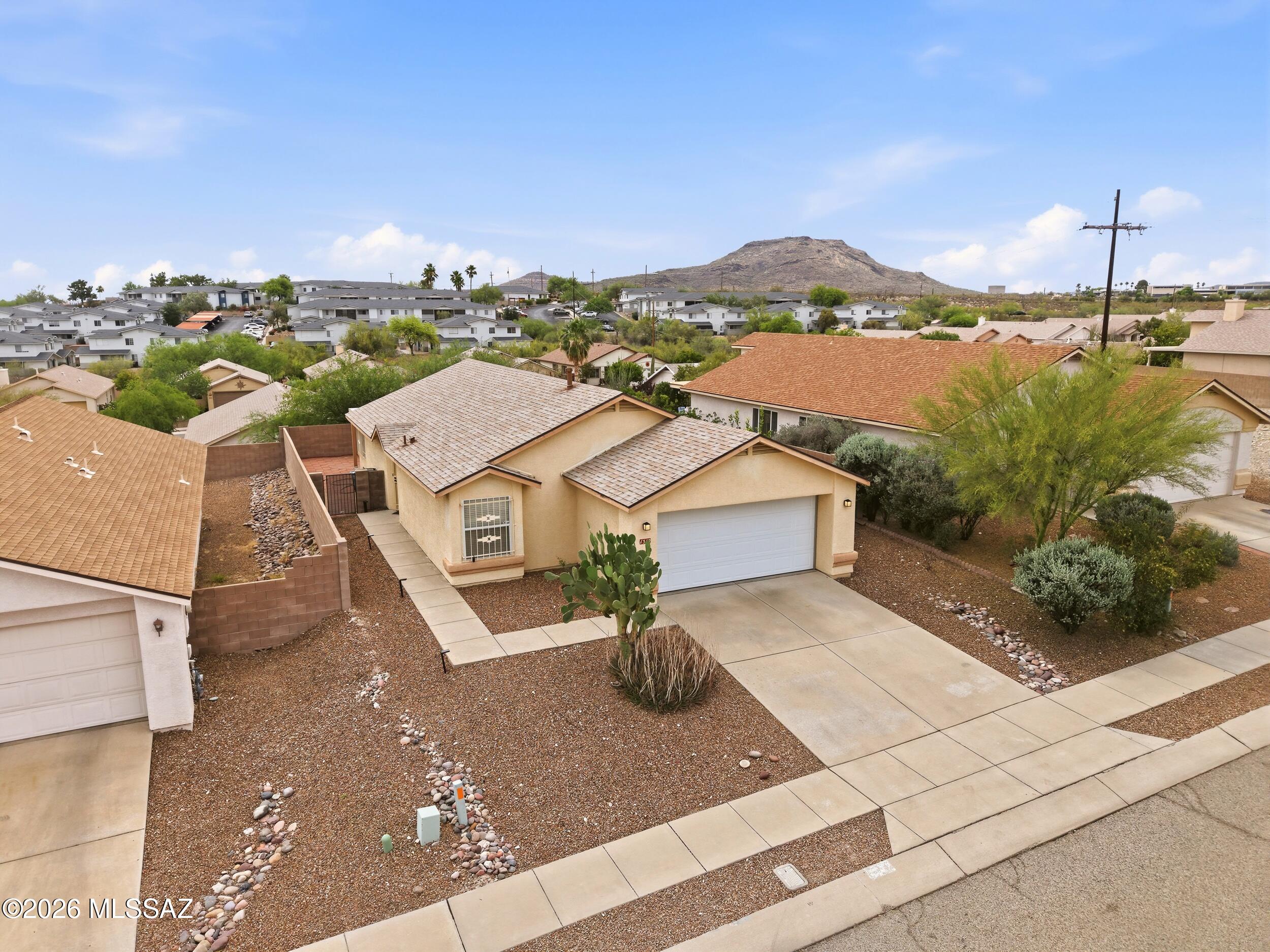 Beautiful west-side home featuring 3 bedrooms and 2 bathrooms with an open great room concept off the kitchen, creating a comfortable flow for everyday living and entertaining. The home has been nicely maintained and offers a clean, move-in-ready feel.

The backyard offers beautiful city and mountain views, providing the perfect backdrop for Tucson sunsets. Conveniently located just minutes from I-10, downtown Tucson, the University of Arizona, Pima West Campus, shopping, and dining. A great opportunity to enjoy west-side living with easy access to everything Tucson has to offer.