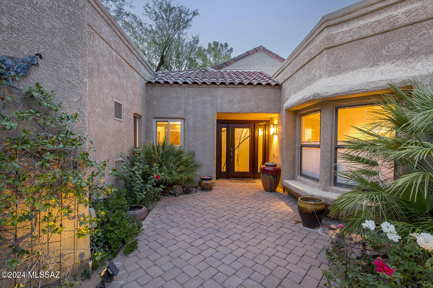 Beautifully Updated and Easy Care Lifestyle Await. Embrace modern Southwestern elegance in this beautifully updated home at 6987 E Nuthatch Trail, nestled within a pristine gated community in Tucson, at the base of the Catalina mountains. Featuring a charming courtyard entry, high vaulted ceilings, and ample natural light from clerestory windows, this home exudes warmth and style. The updated kitchen with charming breakfast room and updated bathrooms offer a blend of rustic charm and contemporary convenience. Enjoy access to a pristine community pool. Golf course membership avail to purchase (over 100 people waiting) , adding to the appeal of this ideally located property near scenic desert landscapes. Gated / Guard community.  Full Appraisal completed Mar 2025 avail w accepted contract