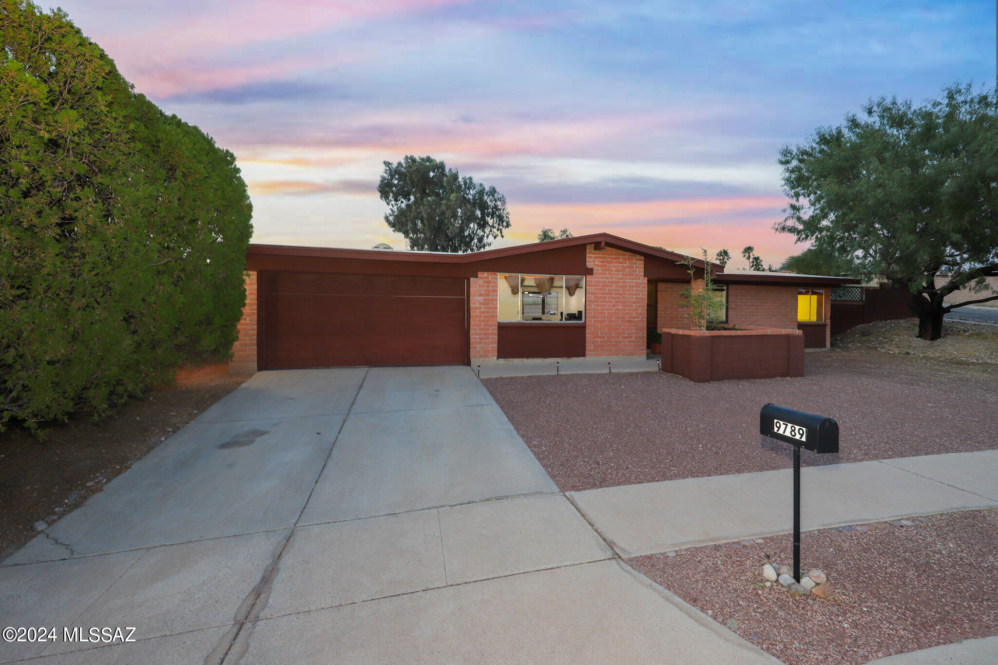 This move-in ready 4-bedroom, 2-bath home with an attached garage offers the perfect blend of comfort, space, and convenience. The flexible floor plan features a spacious living area, cozy den, and bonus room ideal for a home office, playroom, gym, or media room. Enjoy year-round comfort with central A/C, abundant storage, and stylish updates throughout. Situated on a large corner lot, the oversized backyard offers endless possibilities for entertaining, gardening, pets, or outdoor living. Conveniently located near The Loop, Fantasy Island Mountain Bike Park, shopping, dining, schools, major employers, and easy commuter access. This is a  fantastic opportunity to own this nice home.