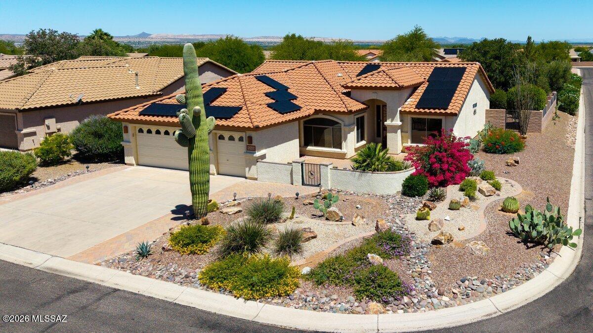Nestled on a desirable corner lot in the vibrant Robson adult gated community of Quail Creek, this charming Laredo 2 bedroom, 2 bath home, built in 2003, boasts a pool, 2.5 car garage, which can hold your motorcycle or golf cart. a Open floor plan. Split bedroom plan offers privacy for yourself and your guests. The kitchen features granite countertops, while the primary bath offers a beautifully tiled shower. There is a Murphy bed in secondary bedroom and a den. Built in entertainment center with accent lighting. Extended covered patio is a great place to enjoy morning coffee or adult beverages with your friends and neighbors. Residents enjoy a wealth of amenities including on-site restaurants, golf, pickleball, tennis and more, making it the perfect blend of comfort and community living
