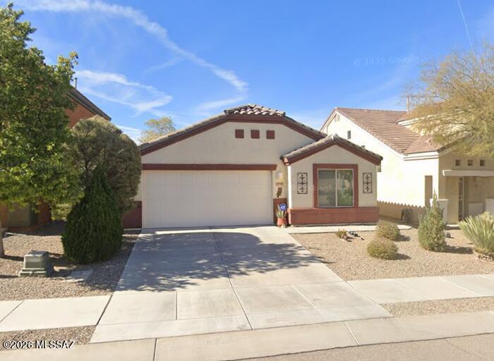 This spacious 1,598 square foot single-story home features 4 bedrooms and 2 bathrooms with an open and functional floor plan. The kitchen comes equipped with modern appliances including a dishwasher, microwave, oven, and refrigerator, providing everything needed for daily living. The living room offers a comfortable gathering space with ceiling fans for year-round comfort and natural airflow throughout the home. Each bedroom includes walk-in closets for ample storage, while the primary suite provides a private retreat with convenient access to one of the full bathrooms. The secondary bedrooms share the guest bathroom, creating a practical layout for families or roommates. The in-unit laundry room includes both washer and dryer, making household tasks convenient and efficient. A 2-car garage with garage door opener provides secure parking and additional storage space, while covered parking ensures protection from the elements. The fully fenced yard offers privacy and outdoor space for relaxation or entertaining. Built in 2012, this well-maintained property features a combination of carpet and tile flooring throughout, along with central air conditioning to keep the home comfortable during Arizona's warm seasons. Located in the desirable Interstate 10 and Kolb Road area of Tucson, residents enjoy convenient access to major transportation routes, shopping centers, dining options, and local amenities.