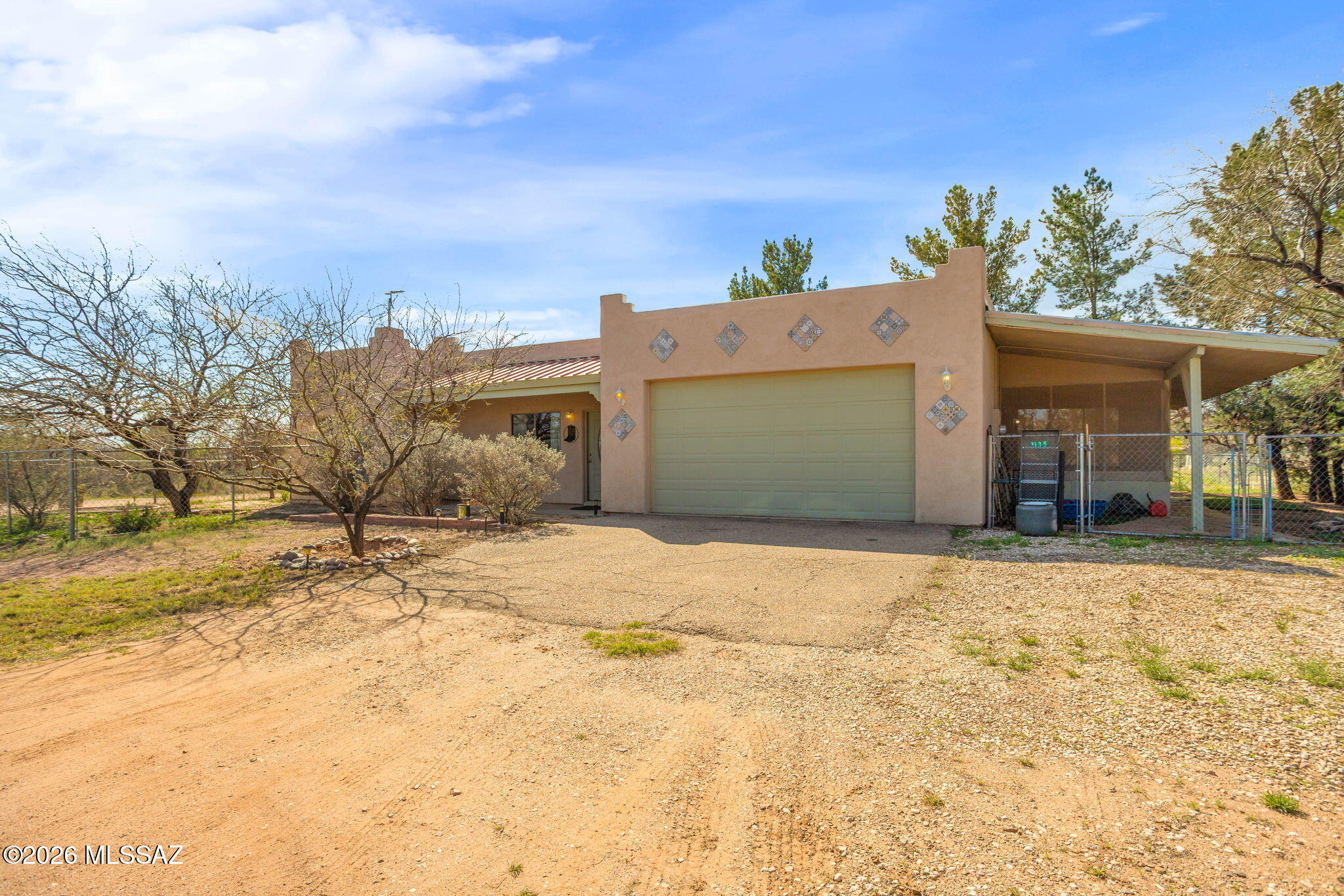 This 3-bedroom, 2-bath site-built home in Benson offers comfort, convenience, and an ideal location just off I-10. Perfectly situated for commuters, it provides easy access to Tucson, Benson, and Sierra Vista. RV parking and oversized garage gives you space for toys and projects. The house is situated between two mountain ranges, minutes away from the Rincon mountain wildernessInside. You'll find a functional floor plan with a spacious living area, a well-designed kitchen with ample cabinet space, and a comfortable dining area. The primary bedroom features a private bath, while two additional bedrooms provide flexibility for guests, family, or a home office. Enjoy the peaceful surroundings and beautiful desert skies that Benson is known for.