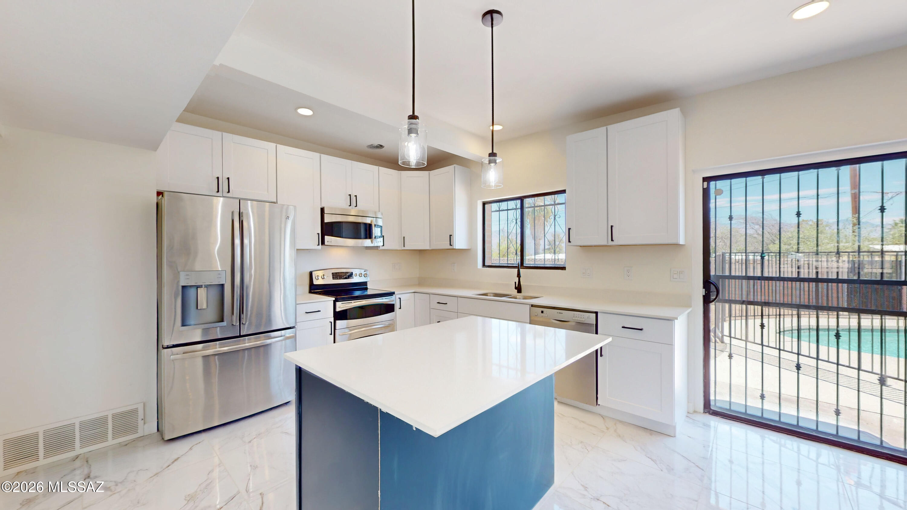 Welcome to this beautifully remodeled 4-bedroom, 3-bathroom home with a dedicated office/den, located on the desirable east side with stunning mountain views and no HOA. Designed with a spacious split floor plan, this home features two primary (double master) bedrooms, offering flexibility for multi-generational living or guests. The inviting living area includes a cozy wood-burning fireplace, creating the perfect gathering space. Step outside to your private backyard oasis with a sparkling pool, ideal for entertaining family and friends year-round. With modern updates throughout, generous living spaces, and an exceptional layout built for hosting, this move-in-ready home offers comfort, style, and convenience in a fantastic location.