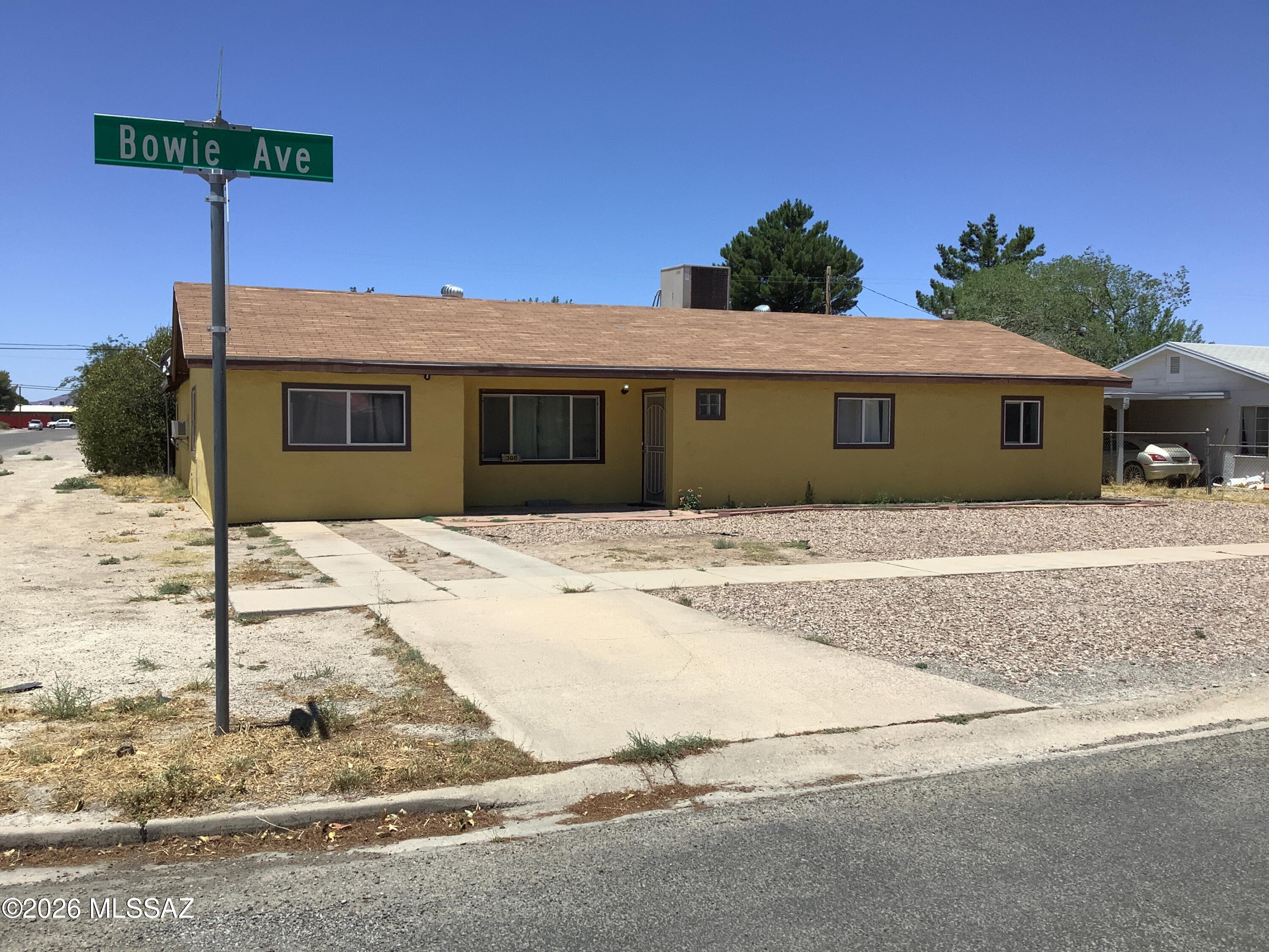 Come check out this large home on a corner lot.  The home offers nice size living room, very large family room, office/den with it's own entrance, fantastic large kitchen with tons of cabinets and walk in pantry along with pantry closet. Large laundry room with backyard entrance. Primary bedroom has an additional sitting room/exercise room as you enter then you go down the hall w/ closet until you reach the very large bedroom with a walk-in closet, bathroom and French doors to the covered back patio.
The back yard is large enough to have a play area, 1 car garage, two nice size storage sheds and dog run and all fenced in.  This is a great family home or a place to have room to roam.