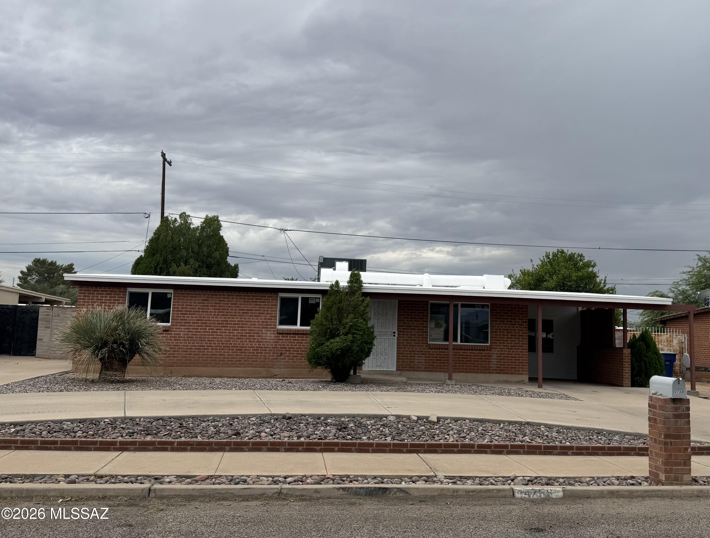 Updated house for sale: solid brick home with a den and new AC.