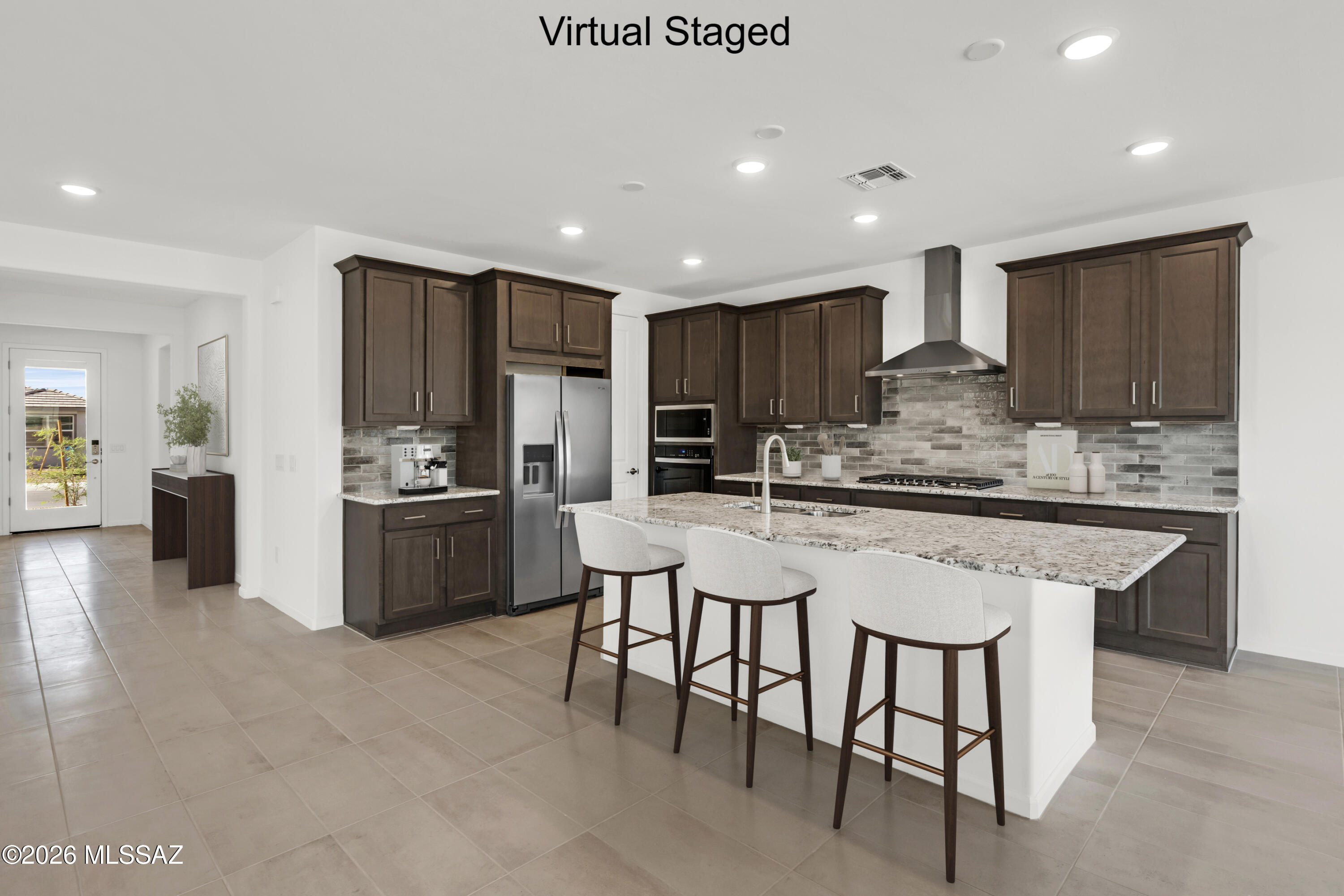 Auburn plan with Desert Modern elevation. Here the heart of your home seamlessly blends the living, dining, and kitchen areas. Enclosed den provides quiet area for work or study. The stylish kitchen boasts gas cooktop, granite countertops, center island & spacious corner walk-in pantry. Owner's suite features huge walk-in closet, vanity with twin sinks, linen closet & walk-in shower. Enjoy the pleasure of outdoor gatherings on the covered back patio which includes a gas BBQ stub-out. Includes 8' interior doors, Whirlpool Refrigerator, Washer/Dryer, faux wood blinds.