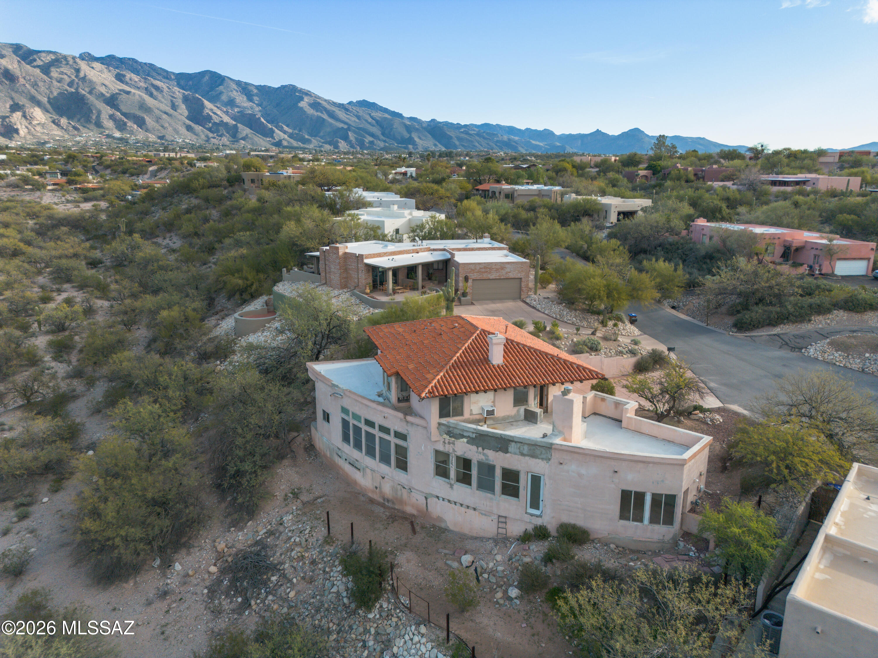 Investor opportunity in the desirable Catalina Foothills. This 4-bedroom, 2.5-bath home presents strong potential for renovation or redevelopment. The property has sustained fire damage and is being sold as-is. Enjoy mountain views and a setting with no rear neighbors, backing to a natural wash. Located in an established Foothills area known for long-term value and demand. Ideal for investors, builders, or buyers seeking a value-add project in a premier Tucson location.