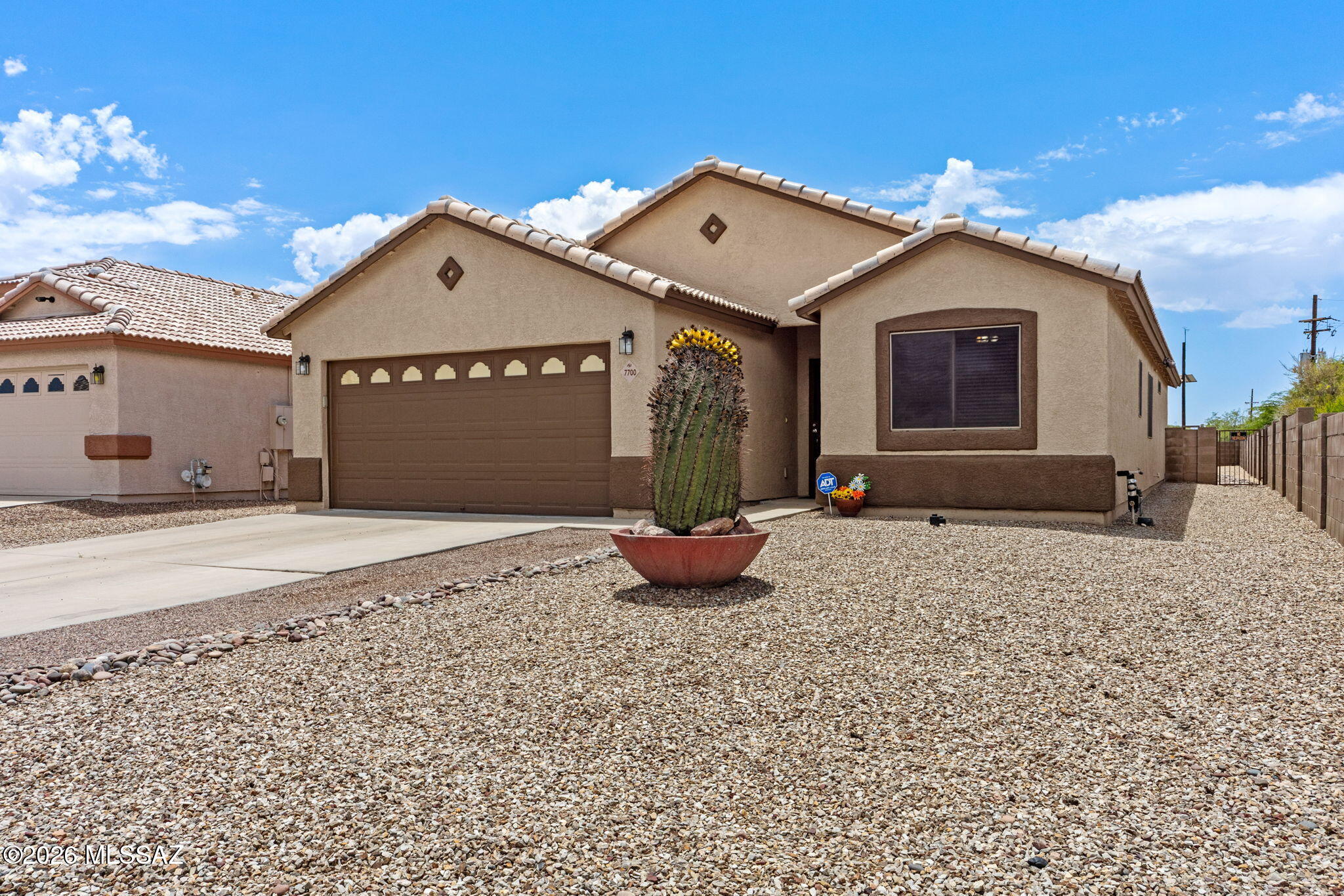 Move-in ready & impeccably maintained home nestled in a quiet northwest neighborhood. This 3bd/2ba features a wonderful great room layout w/plenty of room for entertaining. Kitchen island located in the heart of the home, perfect for gathering, cooking and making new memories with family & friends!  Retire to the backyard with a blank slate of opportunities with the extended flagstone patio areas, oversized lot & outdoor fireplace for starters. Conveniently located near Pima Community College, Northwest Medical Center, the YMCA, restaurants, shopping, golf, malls, and easy I-10 access...This home truly offers the best of Northwest Tucson living.  NOTE: All mechanicals have been replaced within the last 5-7 years. Welcome Home...
