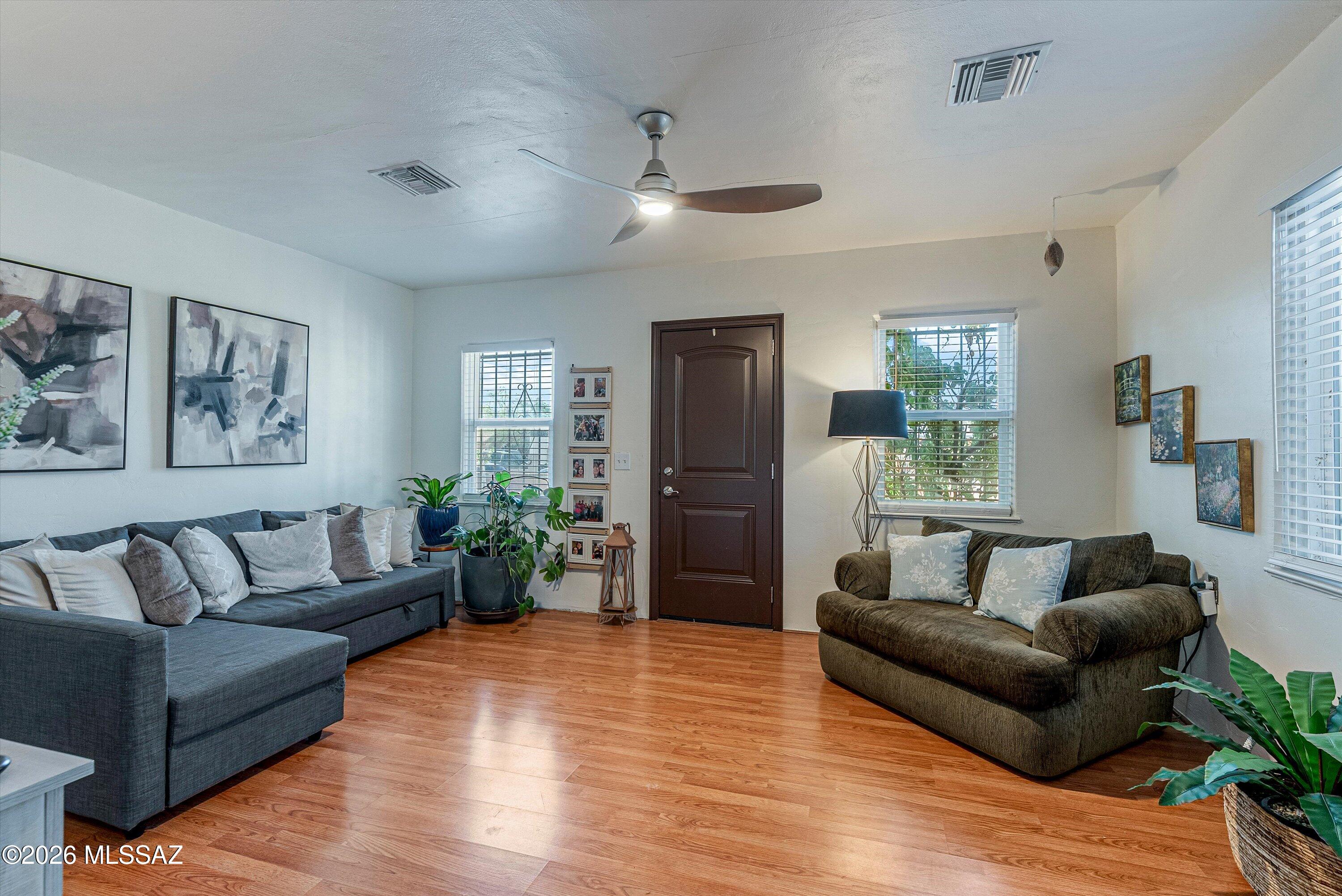 Welcome home to this beautifully updated 3 bedroom, 2 bathroom ranch-style home situated on a large lot with plenty of room to enjoy both indoor and outdoor living. Thoughtful updates throughout include new plumbing and a new water softener as of 2025, providing peace of mind for years to come.
The split-bedroom floor plan offers added privacy, while abundant natural lighting enhances the home's layout and adds ambiance. The large laundry room doubles as an additional storage space.
Outside, both the front and back yards offer ample room for gardening, entertaining, or simply enjoying the outdoors. The backyard features a mature, flourishing grapefruit tree and a large workshop equipped with a mini-split system for year-round heating and cooling--perfect for hobbies, projects, or an additional workspace.