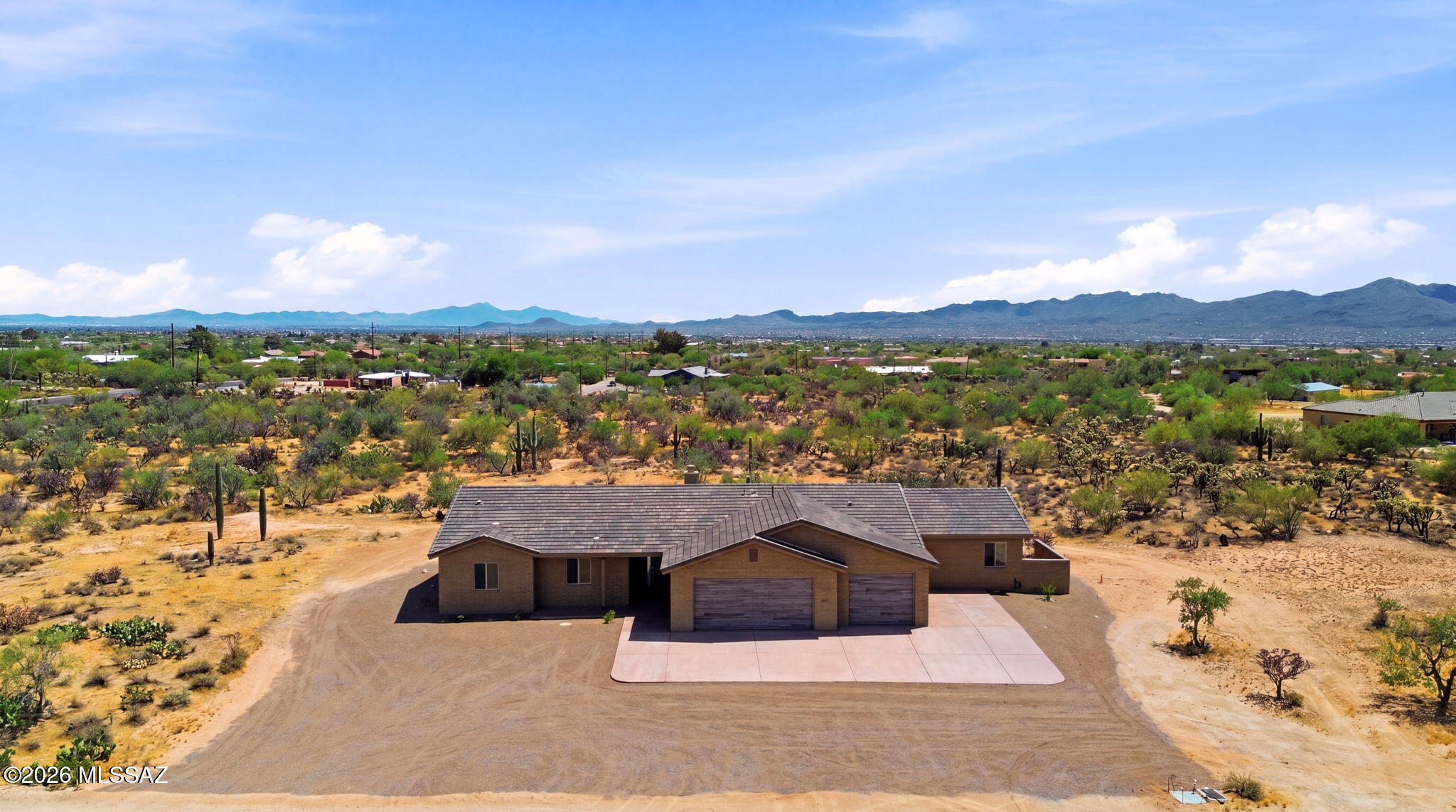 QUALITY, Brand New 4 Bed/ 3 Bath Plus DEN Masonry Construction on 4.154 Acres w/natural desert landscaping & sweeping mountain views! A 3-Car Garage + concrete driveway for extra parking welcomes you. Discover an open, airy layout featuring polished concrete flooring, vaulted ceilings, fire sprinklers, neutral paint, recessed lighting, & a fireplace anchoring the living area. Maple Cabinet Kitchen has SS appliances, abundant cabinetry, quartz counters, & breakfast bar. The main bedroom boasts sliding doors to the backyard, a walk-in closet, & a private bathroom w/dual sinks, a jetted tub, & a glass-enclosed shower. A dedicated laundry room with a sink & cabinets adds convenience! Out back, a covered patio for enjoying stunning mountain views. RV Electric at panel & Solar Ready!