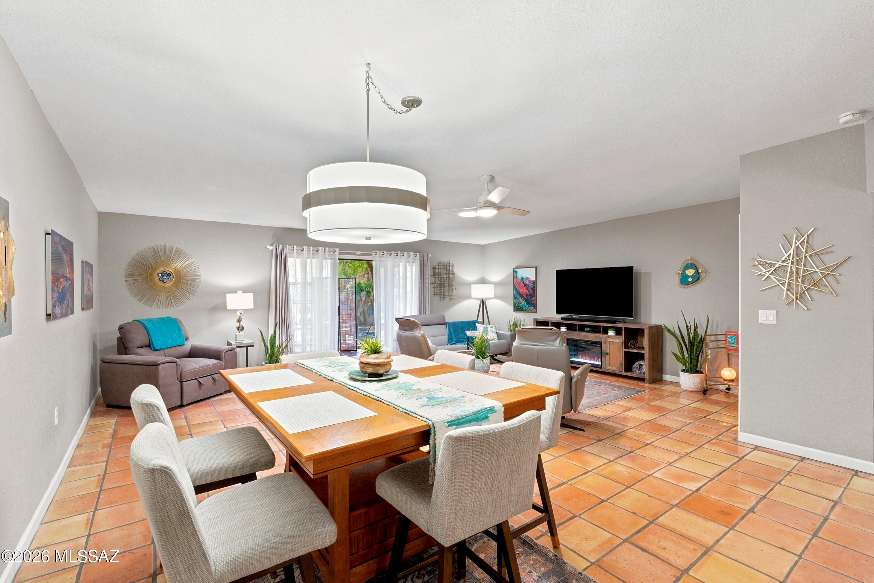 Step inside this impeccably updated, model-perfect end-unit patio home in sought-after La Cholla Hills, where every room reflects the owners' thoughtful design and attention to detail. Located in Fairfield Homes' desirable 55+ active adult community, this exceptional residence combines quality solid masonry construction with effortless, turnkey living.
Offering 1,650 square feet, this 2-bedroom, 2-bath home also features a versatile den, perfect for a home office, hobby room, or guest space. The spacious kitchen is beautifully appointed with granite countertops, a sunny breakfast nook, and a generous walk-in pantry. The open living and dining areas provide an inviting space for entertaining or simply relaxing, while the primary suite offers a large walk-in closet and private bath. Thoughtfully updated throughout, the home features a new HVAC system, range, washer, dryer, ceiling fans, garage door, sunscreens, skylights, Solatubes, carpet, and interior paint. The roof has also been recently recoated, providing added peace of mind.
Situated on a premium oversized end lot, this home offers added privacy and incredible outdoor living space. Even the two-car garage is bright and welcoming with a window and skylights.
Enjoy the resort-style amenities of La Cholla Hills, including two swimming pools, two spas, pickleball, tennis courts, shuffleboard, and a vibrant clubhouse with year-round activities and social events. Conveniently located just minutes from shopping, restaurants, medical facilities, and easy access to I-10, you'll enjoy the perfect blend of comfort, convenience, and the carefree Arizona lifestyle.