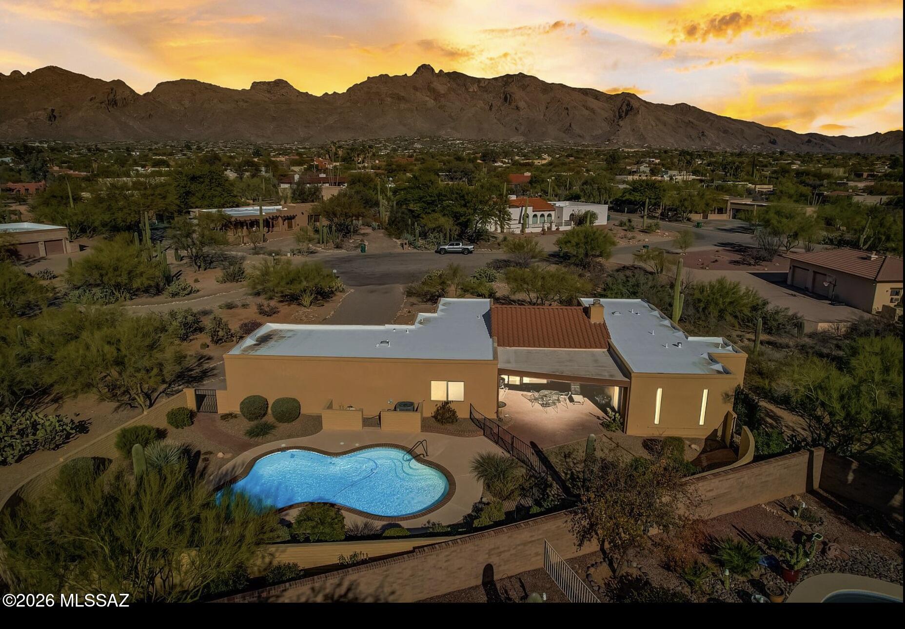 Updated throughout, this 3-bedroom, 3-bath home in Shadow Hills, one of the Catalina Foothills most established neighborhoods within the A+ rated Catalina Foothills School District. Set on a quiet cul-de-sac, this inviting residence blends contemporary updates with its desert surroundings. The updated kitchen & bathrooms feature new cabinetry, quartz countertops, modern fixtures, appliances, and tile flooring throughout - offering timeless style and easy maintenance. Classic lines, vaulted beamed ceilings, & bright, open spaces create a seamless flow throughout the interor. Outside, a sparkling pool and cozy patios provide ideal settings for entertaining or relaxed living. This is an exceptional opportunity for a family or those embracing a simpler chapter to enjoy.