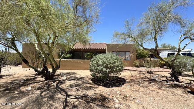 Updated throughout, this 3-bedroom, 3-bath home in Shadow Hills, one of the Catalina Foothills most established neighborhoods within the A+ rated Catalina Foothills School District. Set on a quiet cul-de-sac, this inviting residence blends contemporary updates with its desert surroundings. The updated kitchen & bathrooms feature new cabinetry, quartz countertops, modern fixtures, appliances, and tile flooring throughout - offering timeless style and easy maintenance. Classic lines, vaulted beamed ceilings, & bright, open spaces create a seamless flow throughout the interor. Outside, a sparkling pool and cozy patios provide ideal settings for entertaining or relaxed living. This is an exceptional opportunity for a family or those embracing a simpler chapter to enjoy.