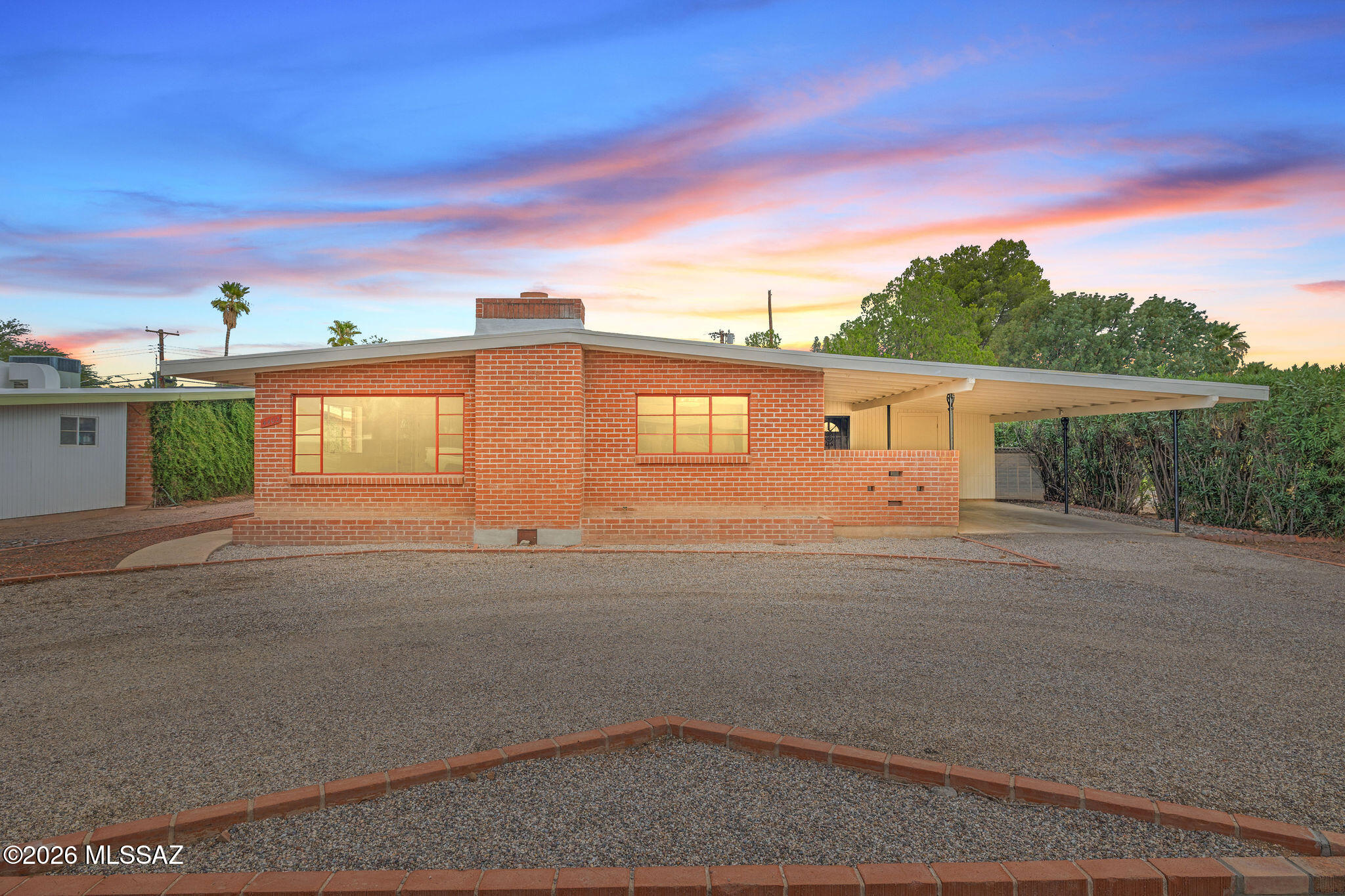 Seller shall accept or counter offers between $425,000-$435,000.
Devall does it again. You have to see her latest creation! Originally built in 1962, this 3BR/2BA
Ranch style home has Catalina mountain views from the main living and dining areas as well as
a spacious floor plan and desirable high ceilings without sacrificing heating and cooling costs. A
spacious second living area, media room, home office or whatever fits your lifestyle gives this
home real livable family space. The kitchen features Samsung Smart appliances including an
Induction range as well as beautiful grain matched premium quartz countertops. The cabinets were thoughtfully designed to maximize storage in the perfect spot, like the deep pot and pan drawers that flank the range to the dual tall pantry cabinets that will please every chef. The bathrooms occupy their original foot yet bring luxury, design and comfort features that only Devall could create. Beautiful stand alone vanities and Delta premium tub shower fixtures. Throughout the home you'll find unique designer lighting elements that complement the original home's era as well as today's sophistication. Additionally, an indoor laundry room with plenty of
storage. All new (May 2026) whole home HVAC system with warranty and hot water heater. To see Devall's other creations get online and look up Devall Design Home.