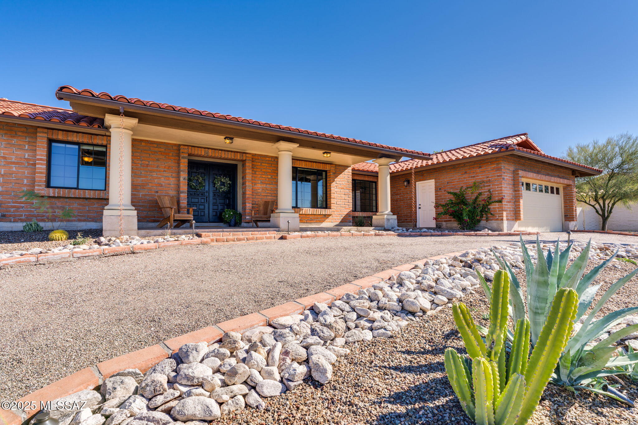 Exceptional value in the foothills! Chastain-built burnt adobe home on .77 acre exemplifies Chastain's reputation for fine masonry craftsmanship. Native Sonoran desert to the front and back of home provides privacy and views of the desert, mountains, sunrise, sunset, and open skies. True chef's kitchen has plentiful cabinetry and work space, newer countertops and appliances, and a charming garden window looking to the pool and back yard. Owner's suite with spa bath features a clerestory window, large walk-in closet and second linen closet. Two additional bedrooms, PLUS a private en-suite guest room. Hall bath is accessible to the pool and studio. Newer tile flooring, HVAC unit, water heater, electrical panel. 5-minute drive to Whole Foods, add'l shopping and dining, Basis Tucson North.