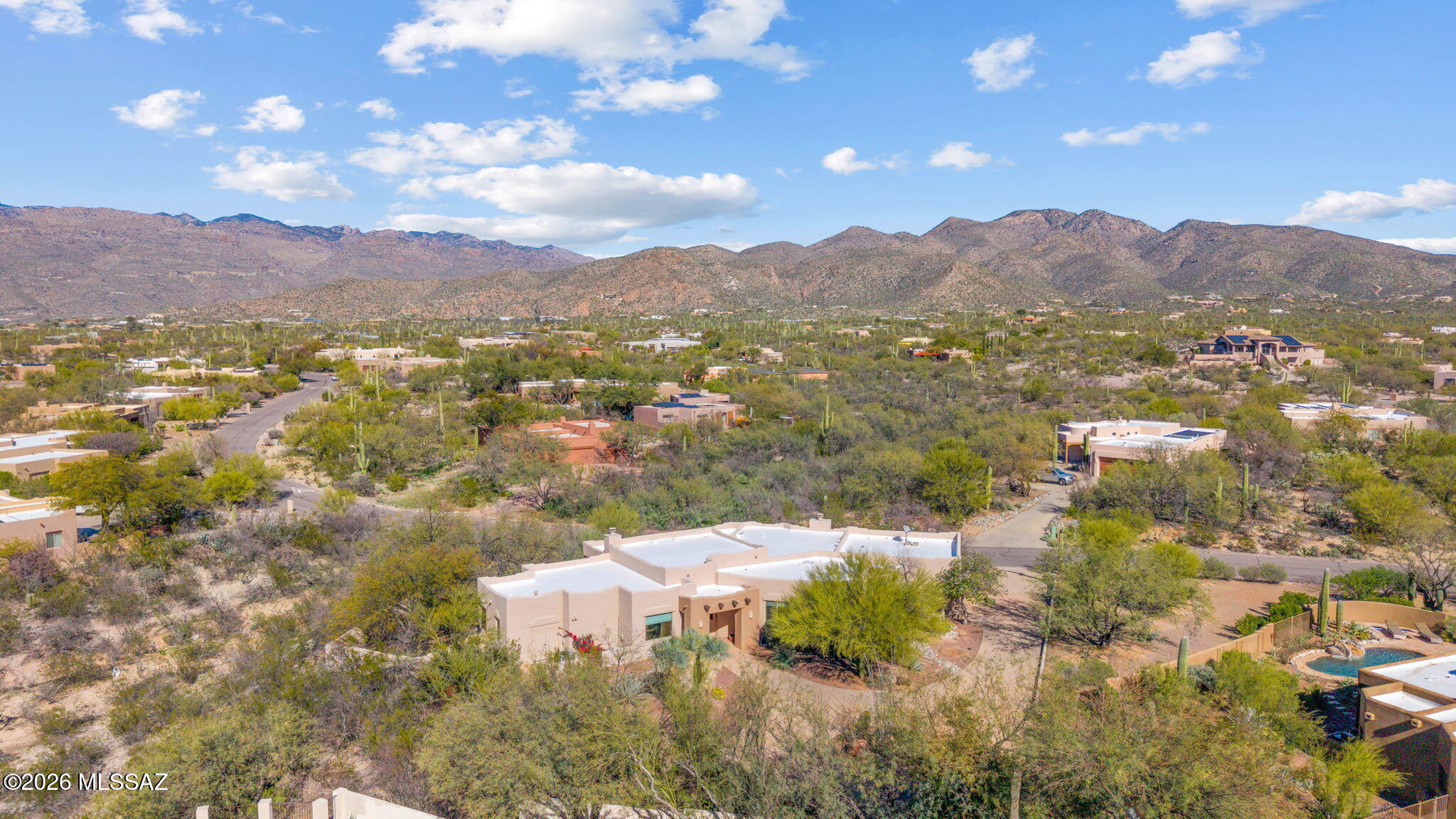Range priced- seller will accept or counter offers within the range of $699,000-$759,000.
Southwest living at it's finest! Beautiful southwestern Tucson style home with 3 bedrooms, 2.5 bathrooms and a separate den/office room. Stunning views from every room, natural wood beams, two fireplaces, one in each large living area, split floorplan with primary bedroom boasting an extra nook and stunning Catalina mountain views and a backyard for peace and relaxation with a huge covered patio and sweeping views. As you walk in you are greeted with picture windows and a large living area with beehive gas fireplace. The other family room is off the kitchen is also spacious with patio access to the backyard. Private HOA makes this NE subdivision a desert dream.