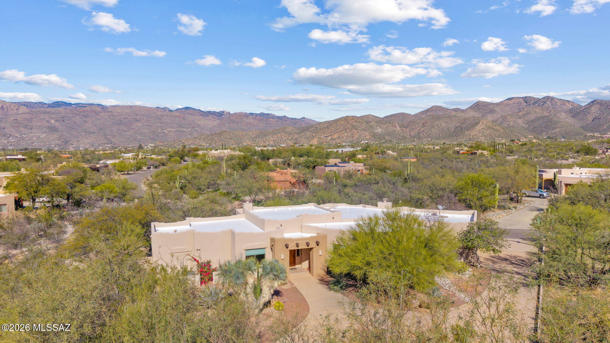 Range priced- seller will accept or counter offers within the range of $689,000-$749,000.
Southwest living at it's finest! Beautiful southwestern Tucson style home with 3 bedrooms, 2.5 bathrooms and a separate den/office room. Stunning views from every room, natural wood beams, two fireplaces, one in each large living area, split floorplan with primary bedroom boasting an extra nook and stunning Catalina mountain views and a backyard for peace and relaxation with a huge covered patio and sweeping views. As you walk in you are greeted with picture windows and a large living area with beehive gas fireplace. The other family room is off the kitchen is also spacious with patio access to the backyard. Private HOA makes this NE subdivision a desert dream.