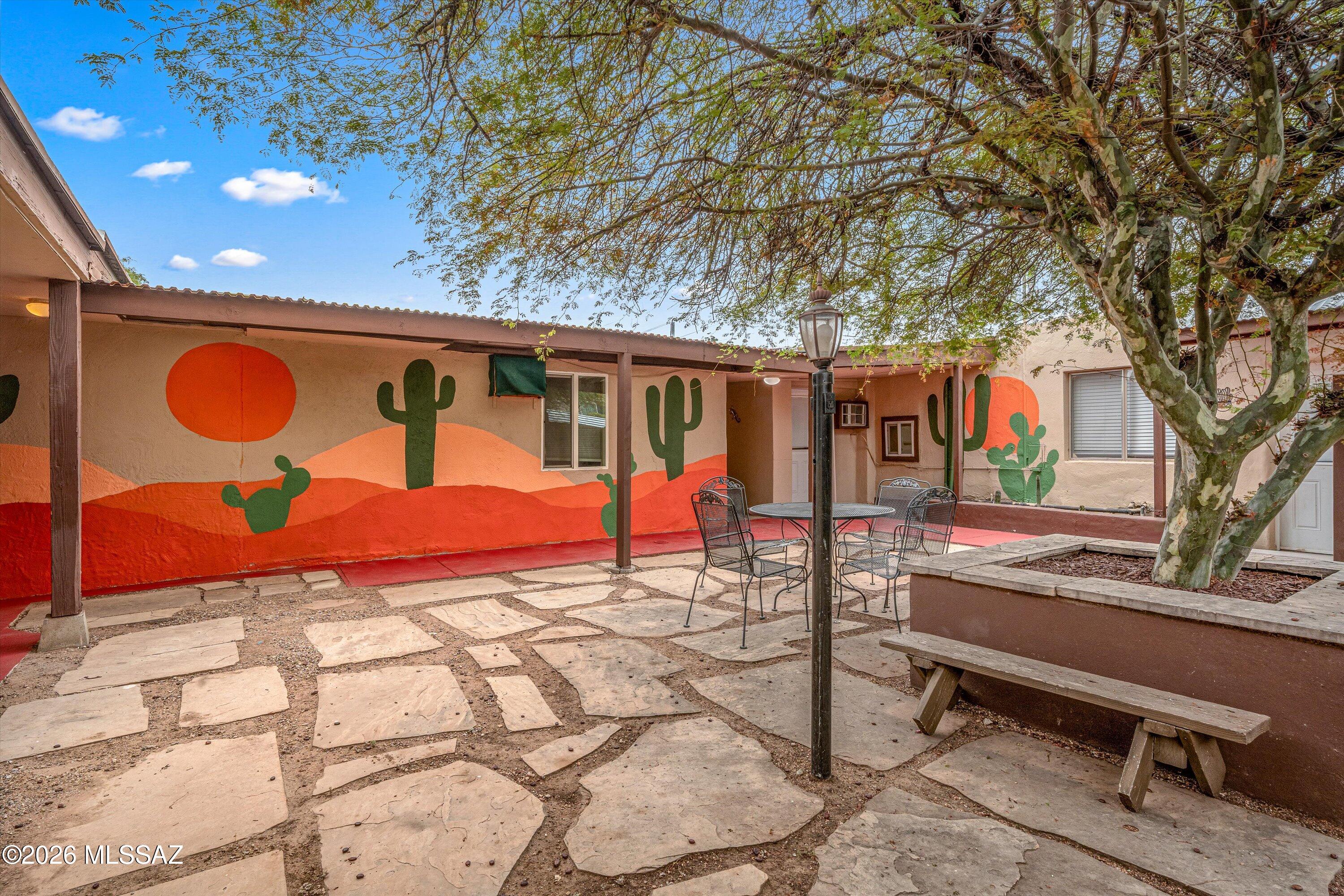 Excellent investment opportunity with four separate rental units and well-designed outdoor spaces ideal for relaxing or entertaining. The property includes a shared courtyard, BBQ area, and a coin-operated laundry room with change machine, creating added convenience for tenants and an additional income stream. Located across from the sought-after Winterhaven neighborhood in central Tucson, with close access to UMC, the University of Arizona, parks, shopping, and dining. The unit mix offers a variety of layouts to appeal to a wide range of renters. The main unit is a spacious 4 bedroom, 2.5 bathroom home of approximately 1,850 square feet, featuring a functional kitchen with stainless steel appliances and a breakfast bar. A separate studio unit offers 1 bedroom and 1 bathroom approximately 500 square feet, complete with a gas stove and full bath. Another unit includes 2 bedrooms and 1 bathroom across approximately 800 square feet with tile flooring and a private patio. The fourth unit features 2 bedrooms and 2 bathrooms at approximately 960 square feet, including a large primary suite with an attached office space.

Each unit has dedicated off-street parking and carport access. The property is well suited for both short-term and long-term rental strategies, giving investors flexibility to meet their goals.

Strong potential, prime location, and multiple income streams make this a standout opportunity.