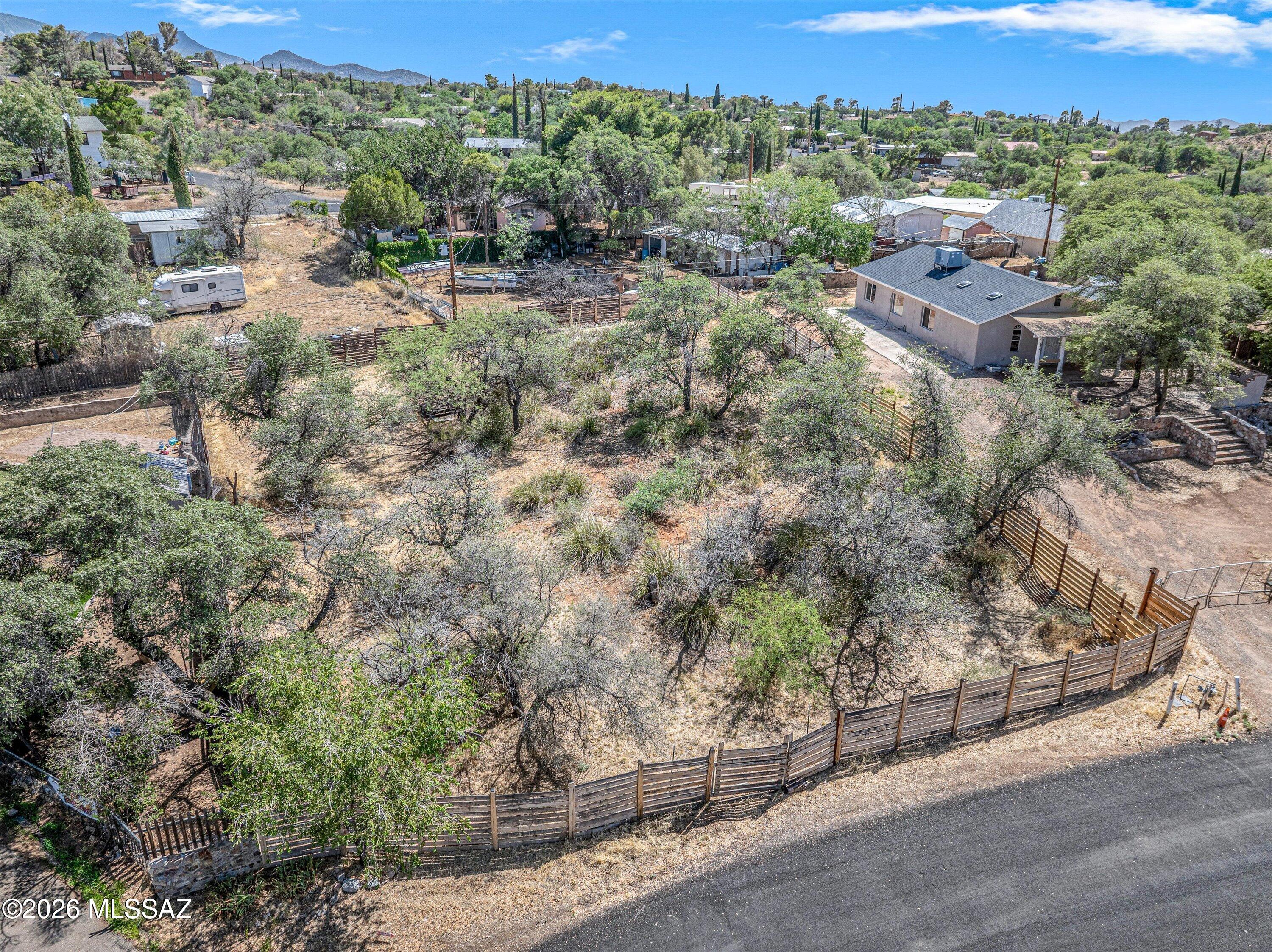 Come build your dream home among the oak trees in the peaceful town of Oracle. Flat and useable .29 acre lot, with plenty of space to build. Water, electric and natural gas are at lot line, buyer to verify utility availability. No HOA! Escape city life, only 20 minutes away from Catalina and Oro Valley. With an ideal year-round climate at 4500' elevation and many in-town attractions / delicious restaurants, this is truly a community worth joining!