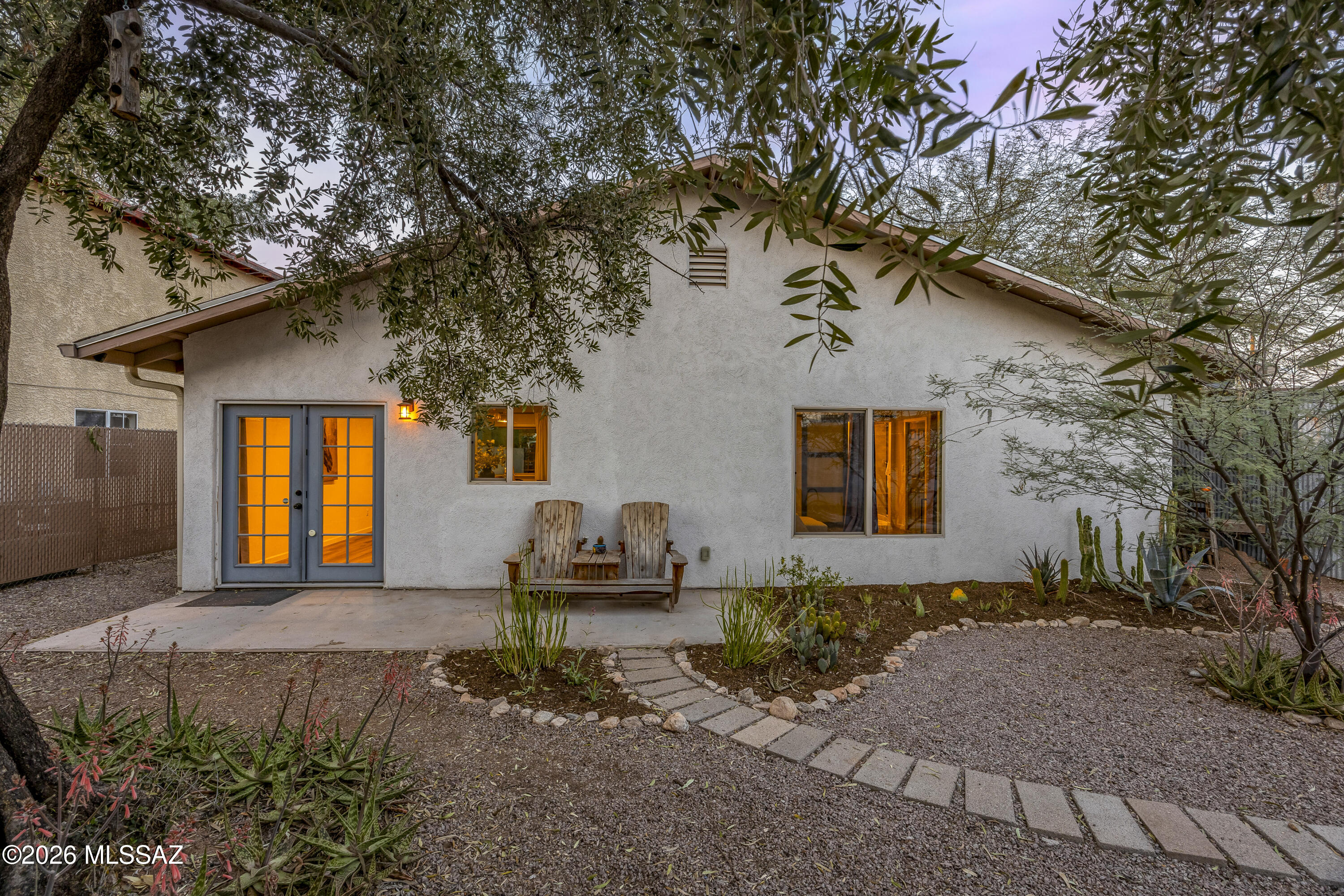 Seller Will Consider Offers from $400,000-$435,000.  Tucked away in the heart of Midtown Tucson, this thoughtfully maintained home offers the perfect blend of comfort, privacy, and lifestyle. From the moment you arrive, the lush landscaping and welcoming curb appeal create a peaceful retreat feel that's hard to find in central Tucson. Inside, natural light fills the home while the open layout creates an easy flow between living spaces. Spacious bedrooms provide comfort and flexibility, while the backyard offers mountain views, mature vegetation, and multiple areas to relax and unwind.  Beyond the beauty, this home has been exceptionally cared for with valuable upgrades including copper plumbing, tankless water heater, solar,  irrigation, and more. Located just minutes from some of Tucson's favorite local restaurants, shopping, and amenities.