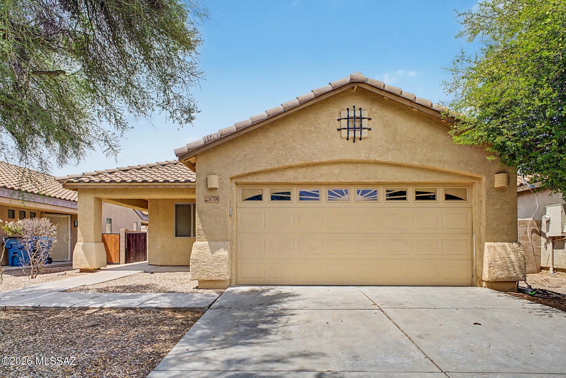 Welcome to this beautifully maintained 3-bedroom, 2-bath home in the desirable Star Valley community! This move-in ready home offers 1,328 sq. ft. of open living space with vaulted ceilings, a split-bedroom floor plan, and abundant natural light. The kitchen features stainless steel appliances, a gas range, pantry, breakfast bar, and breakfast nook. The spacious primary suite includes a walk-in closet and double vanity. Enjoy a low-maintenance backyard with a paver patio and mature desert landscaping. Qualified buyers may assume the existing 3.99% fixed-rate solar loan, providing valuable long-term energy savings. Conveniently located near parks, schools, shopping, dining, and I-19.
