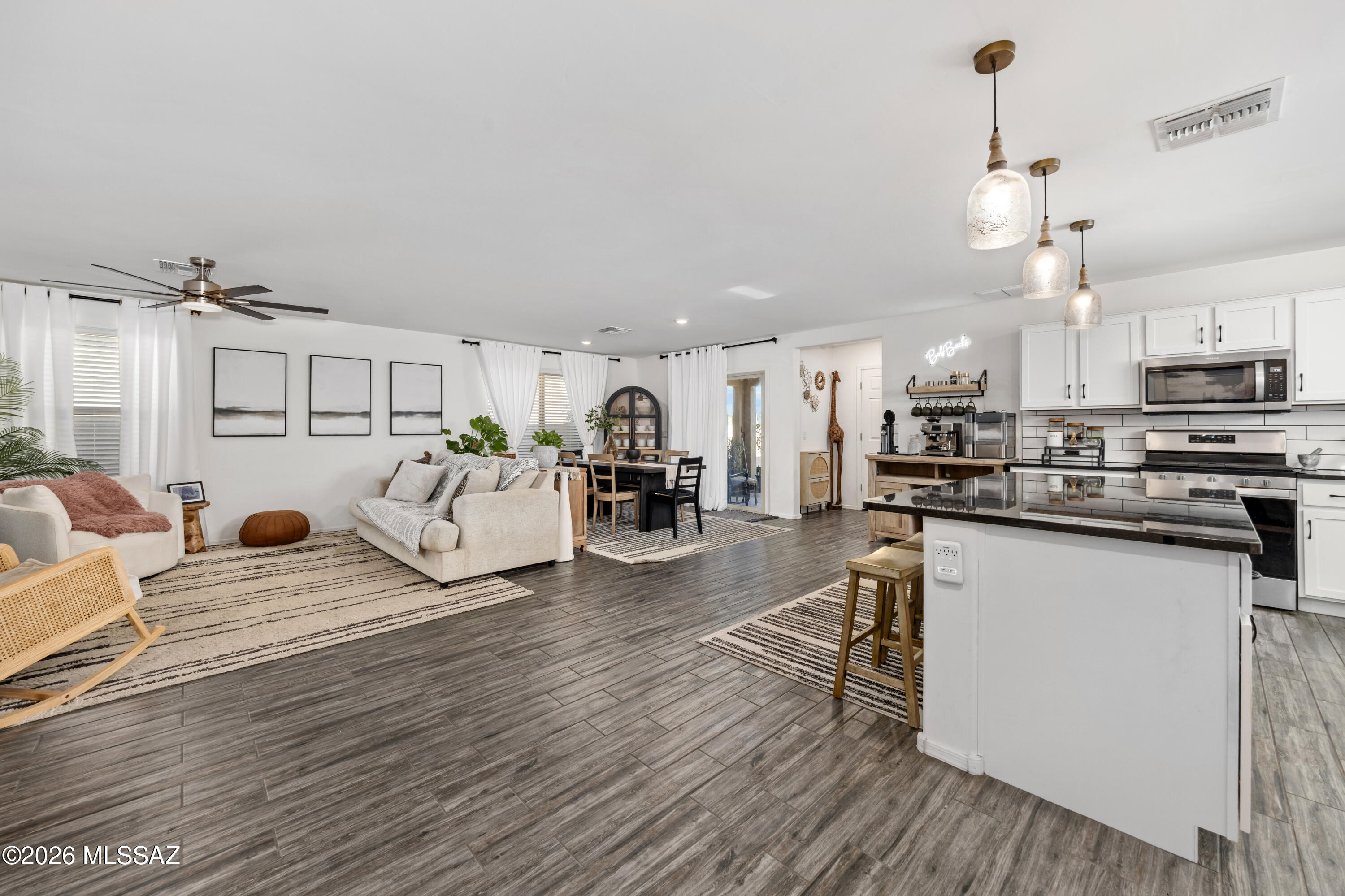 Seller will accept or counter offers between $340,000-$350,000.
Seller willing to contribute up to $5,000 towards Seller Concessions with acceptable offer.
Beautifully maintained single-story home in the sought-after Rancho Sahuarita community! This 3 bedroom, 2 bathroom home offers privacy with no rear neighbors and scenic desert trail views out front. Inside, you'll find granite countertops, an open-concept layout, a versatile den ideal for a home office or flex space, and no carpet throughout. The home also features a radiant barrier roof for improved energy efficiency. The spacious backyard offers endless potential for entertaining or relaxing. Located minutes from Sahuarita Lake and the Rancho Sahuarita Clubhouse with access to pools, water slides, parks, tennis courts, walking trai