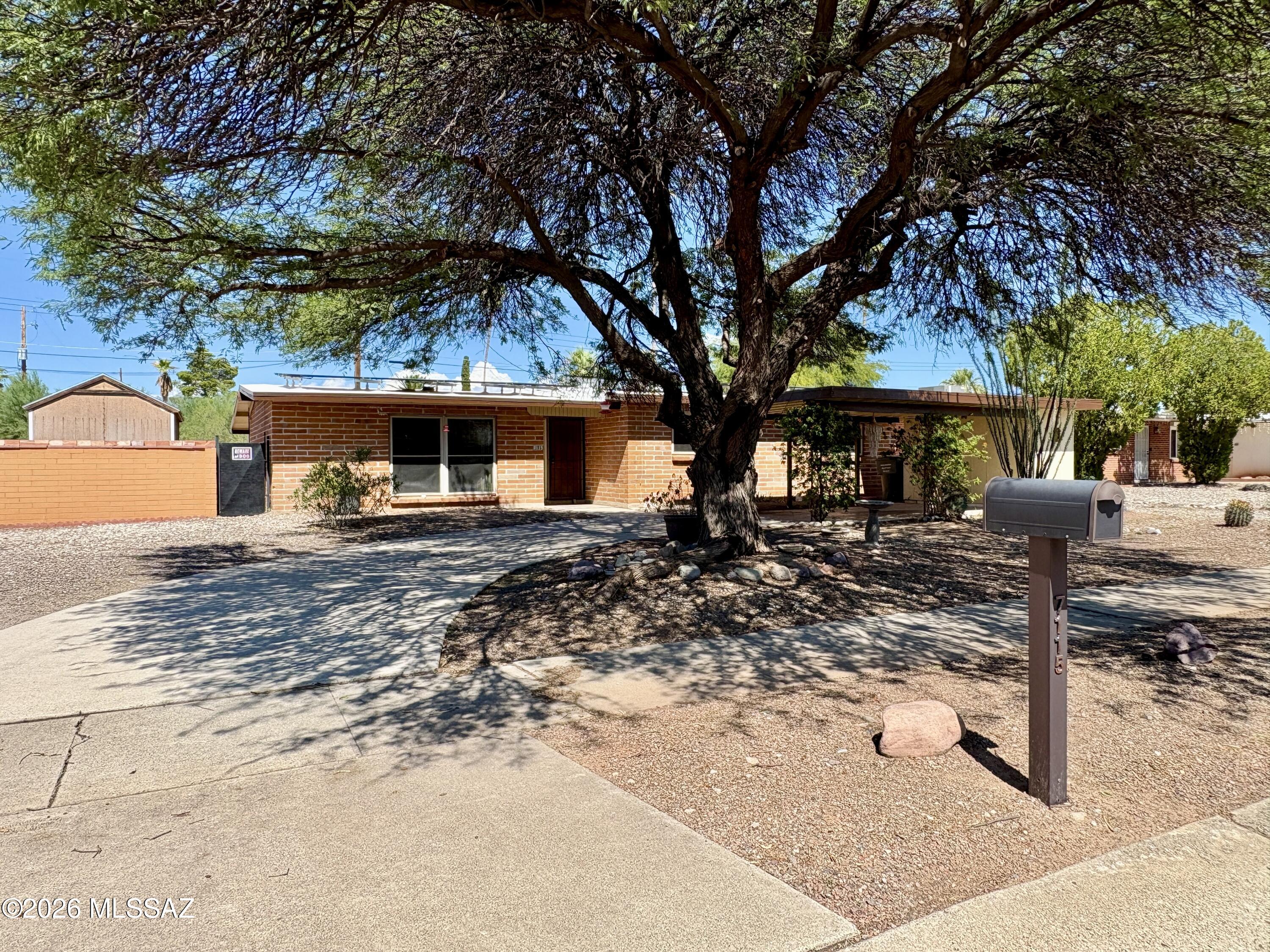 *Ranged price, Seller will accept or counter offers between $299k-$310k* Home sweet home! This fabulous Eastside home has it all, including a POOL to keep you nice and cool during the heat of summer. With new pool equipment, too! Plus fully owned Solar panels for BIG monthly savings! Your electric bills will be little to none. Tucsons beauty shines in this 3 bedroom, 2 bathroom home. Walk in to the living room and be greeted by lovely natural light shining from large windows. Kitchen is complete with beautiful Hickory wood cabinetry with crown molding, quartz countertops and glass tile backsplash. New slate steel appliances. Plus gorgeous Saltillo tile, true to the southwest style. French double doors open into great size AZ room with ceiling fans and mini-split for added comfort! Huge backyard has a workshop, patio and of course the pool! All bedrooms are spa, as well. Priced to sell! This one won't last long!