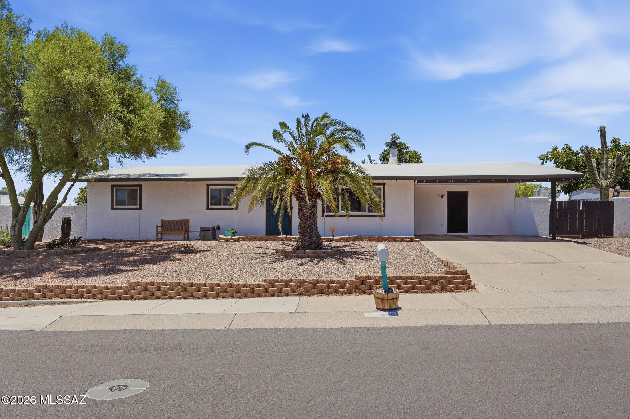 Move-in Ready! An incredible opportunity to own a beautifully maintained home in the highly desirable Northwest community of Sunny Hills Estates with no HOA! Blending timeless charm with modern comfort, this inviting home sits on a sizable lot featuring mature citrus trees and plenty of room to enjoy the Arizona lifestyle. The spacious updated kitchen overlooks the backyard and opens to the dining area, making it ideal for everyday living and entertaining. Generous bedroom sizes provide comfortable retreats, while the large storage shed offers added convenience and storage. Recent improvements include roof resealed in 2025 and fresh exterior paint in 2025. Conveniently located near shopping and dining. Don't miss this opportunity!